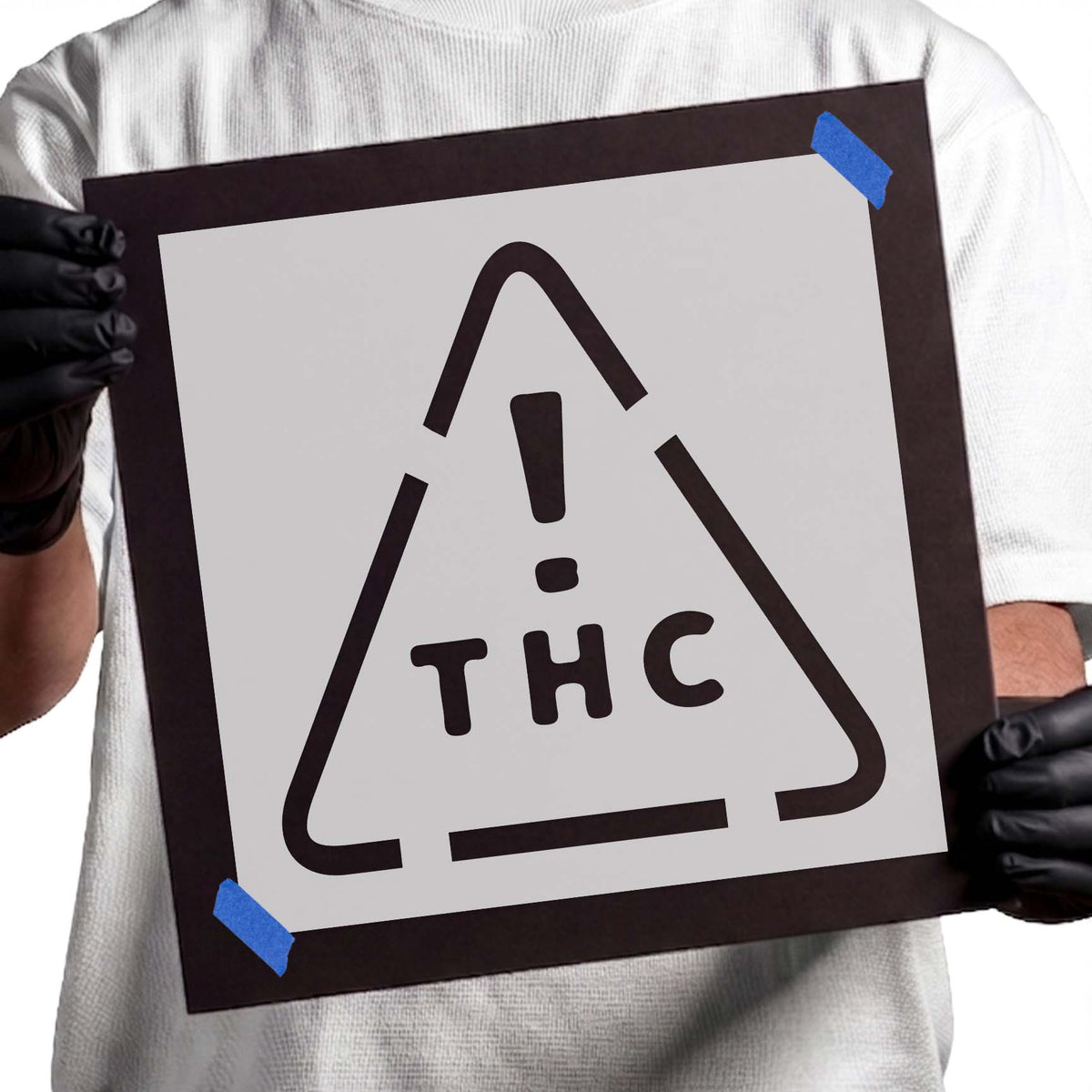 THC Symbol Stencil shown on a display board with a bold warning-style symbol