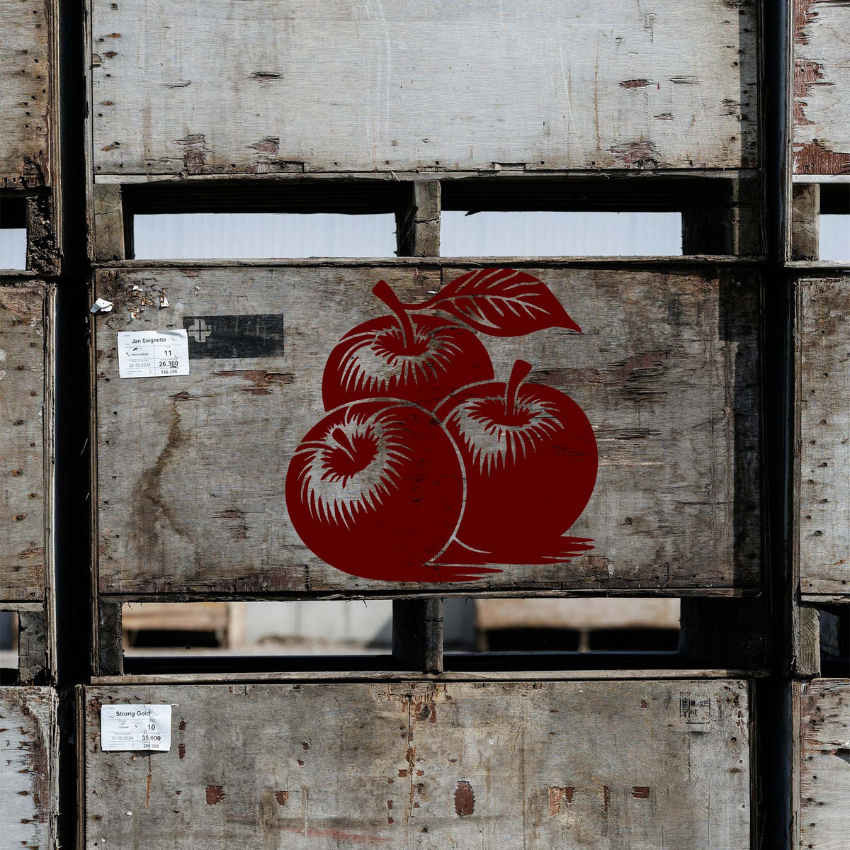 Rustic wooden crates display the Three Apple Cluster Stencil painted in rich red.
