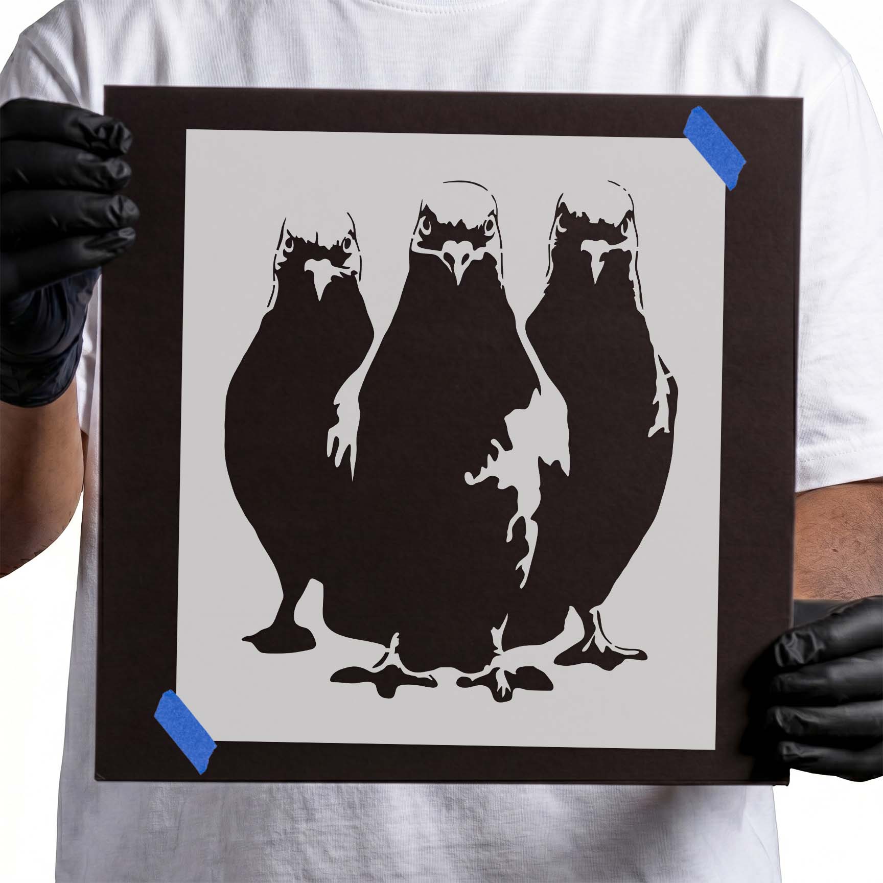 Three pigeons standing side by side in a bold silhouette