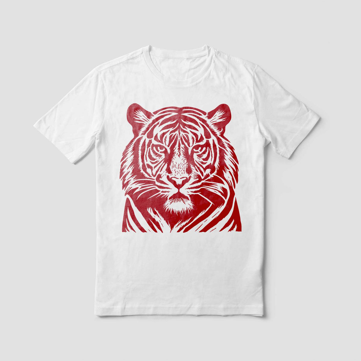 Detailed Tiger Face Wildlife Stencil in red displayed on a white T-shirt.