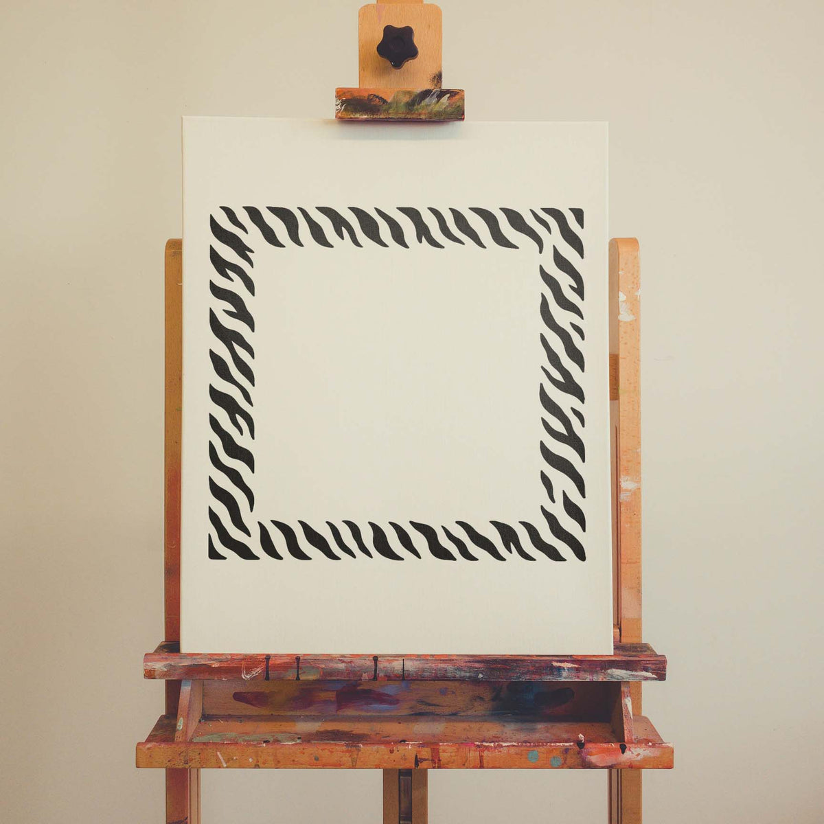Graphic Tiger Stripe Border Stencil frames a clean canvas with flowing wildcat stripes