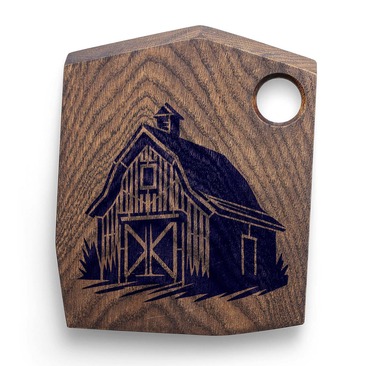 Traditional Wooden Barn Stencil engraved in dark blue on a rustic wooden cutting board.