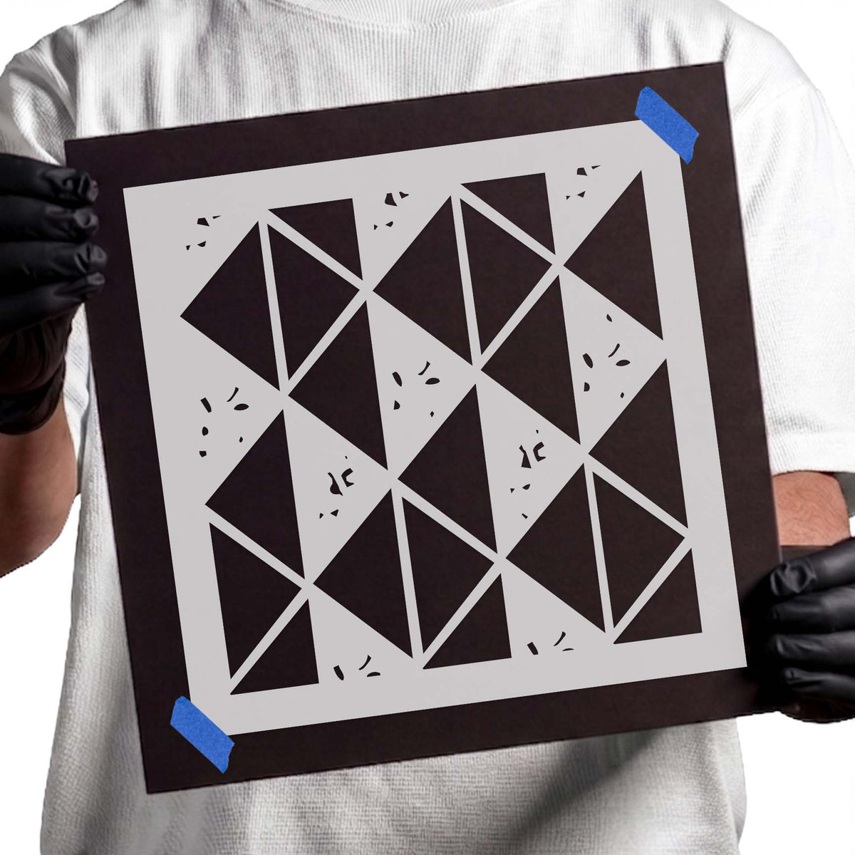Triangular Pattern Stencil featuring alternating triangles, diagonal lines, and abstract accents