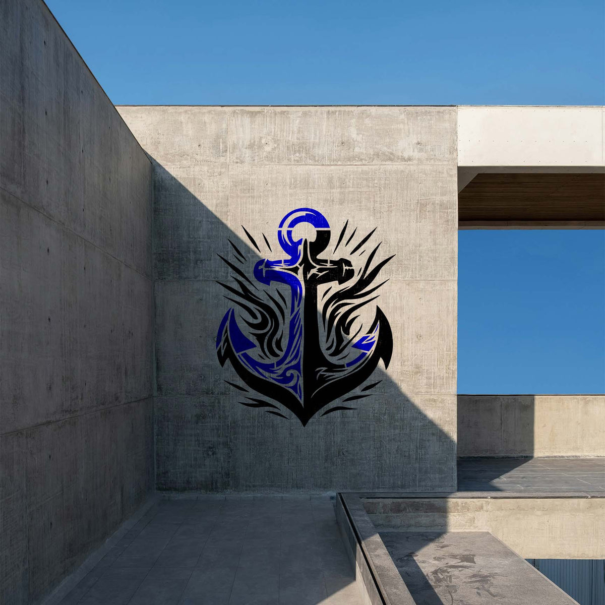 Bold blue and black Tribal Anchor Emblem Stencil decorates a modern concrete wall