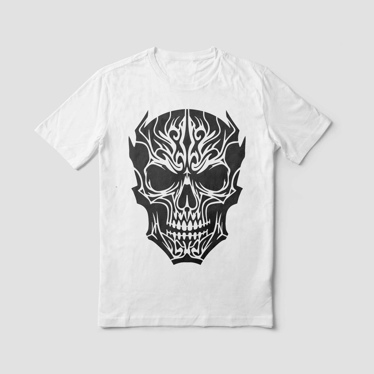 A white shirt features the Tribal Gothic Skull Stencil with sharp symmetrical tribal detailing