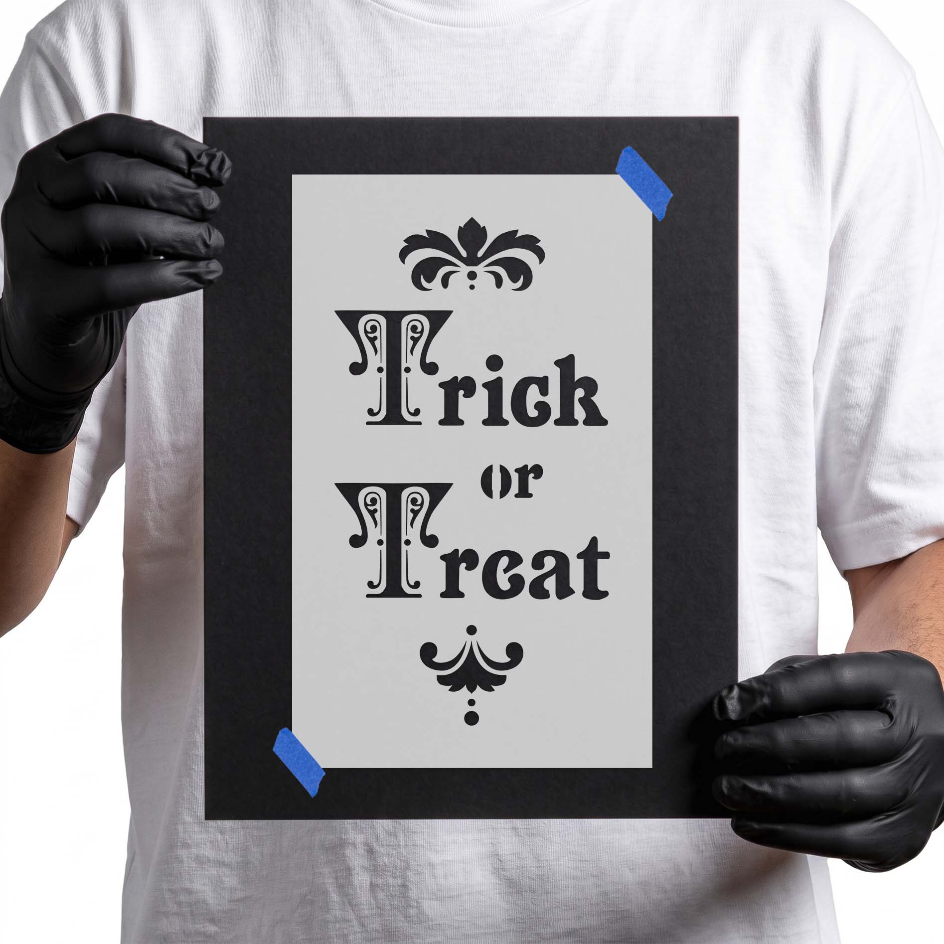 Person holding reusable Trick or Treat Sign Stencil