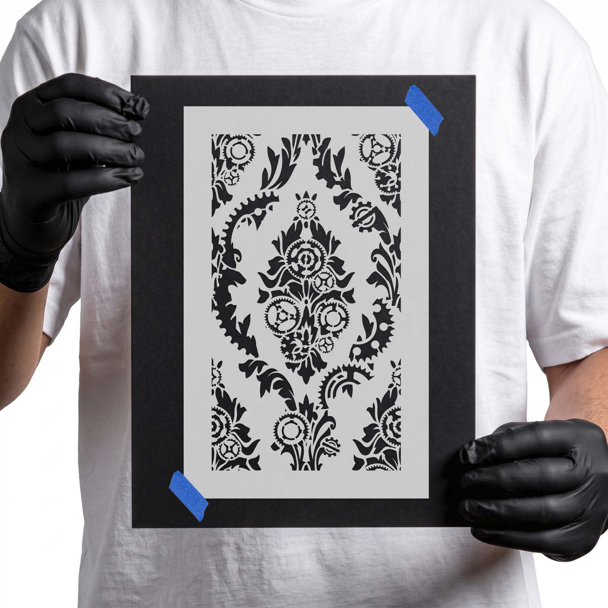 Floral gear stencil with ornate leaves, cogwheels, and mechanical details