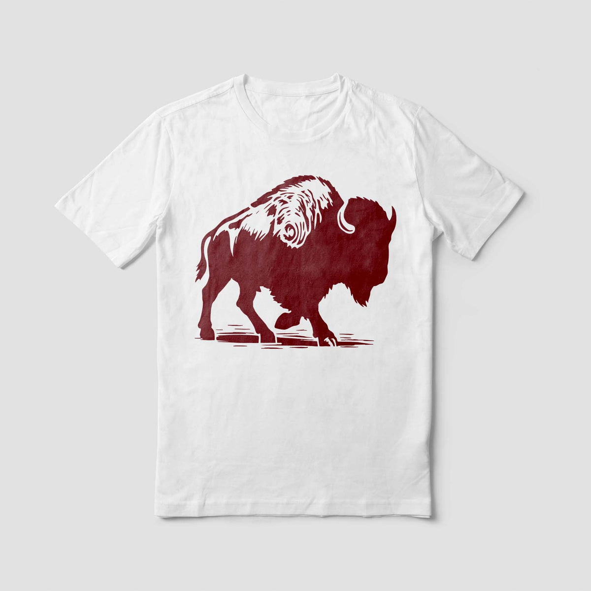 Western wildlife style comes alive with Walking Bison Side Profile Stencil on a white T-shirt.