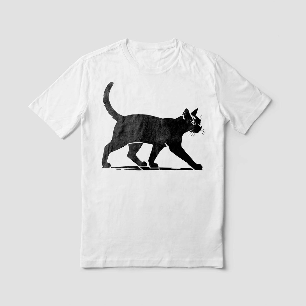 Bold Walking Cat Silhouette Stencil shows a sleek feline stride across a crisp white T-shirt