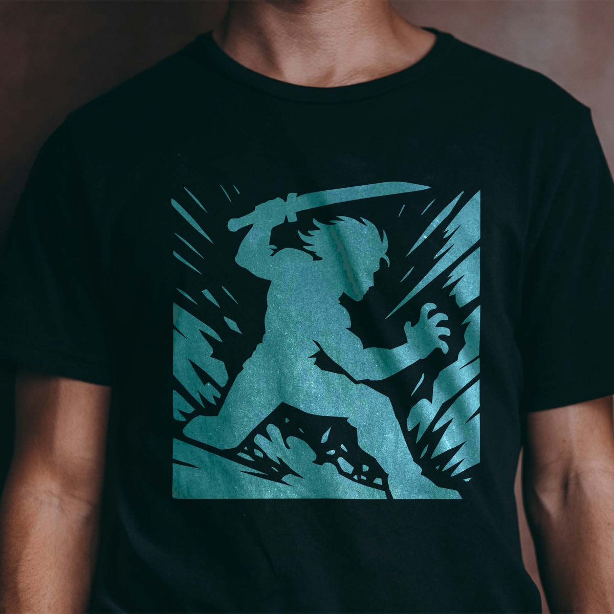 Shadow Blade Warrior Stencil in blue on a black T-shirt with raised sword silhouette.