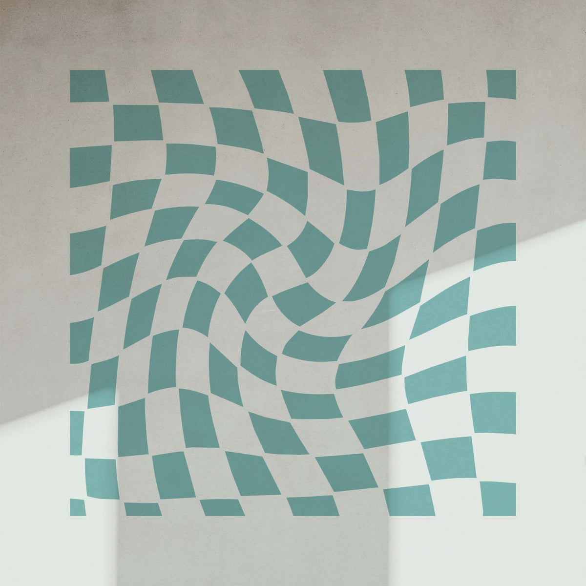 Soft shadows frame the Wavy Checkerboard Stencil in mint green on a smooth white wall.