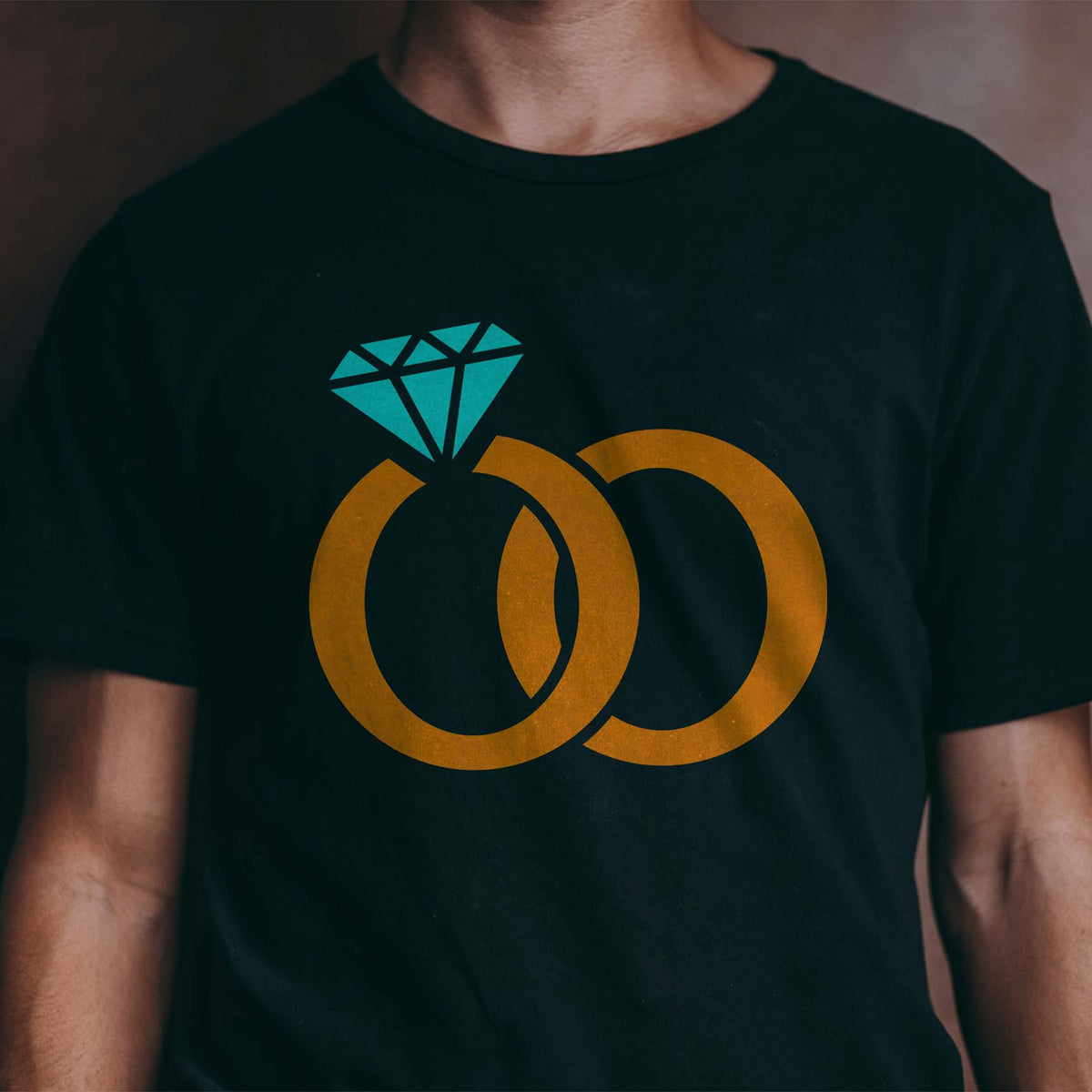 Interlocking Wedding Rings stencil with diamond design painted on black shirt