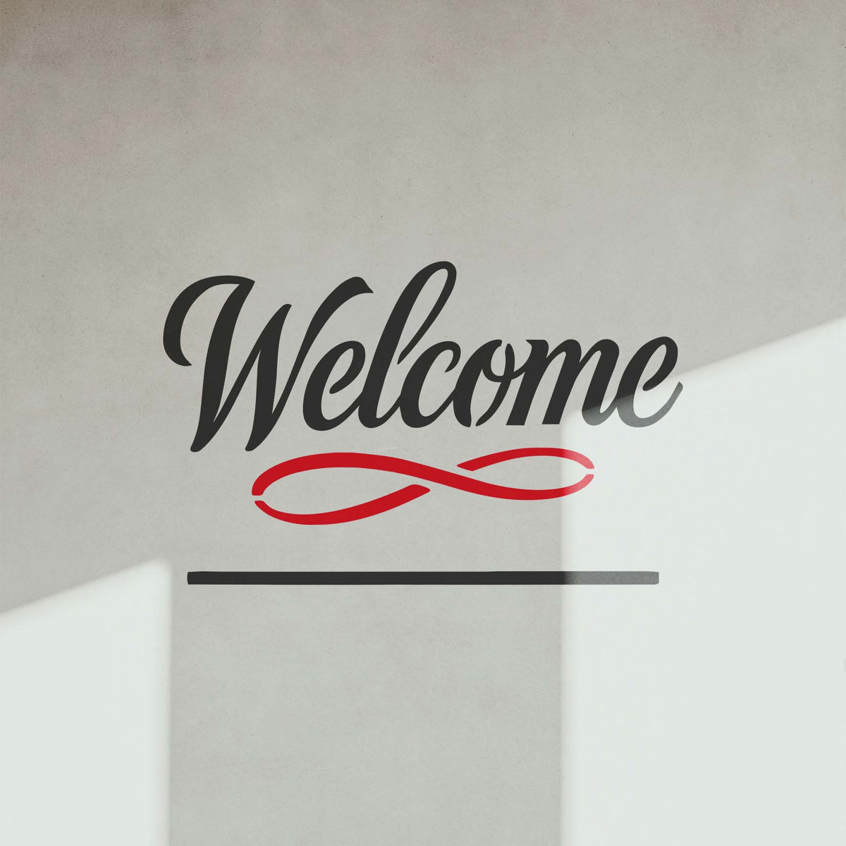 Welcome Script Address Sign stencil with flourish displayed on interior wall