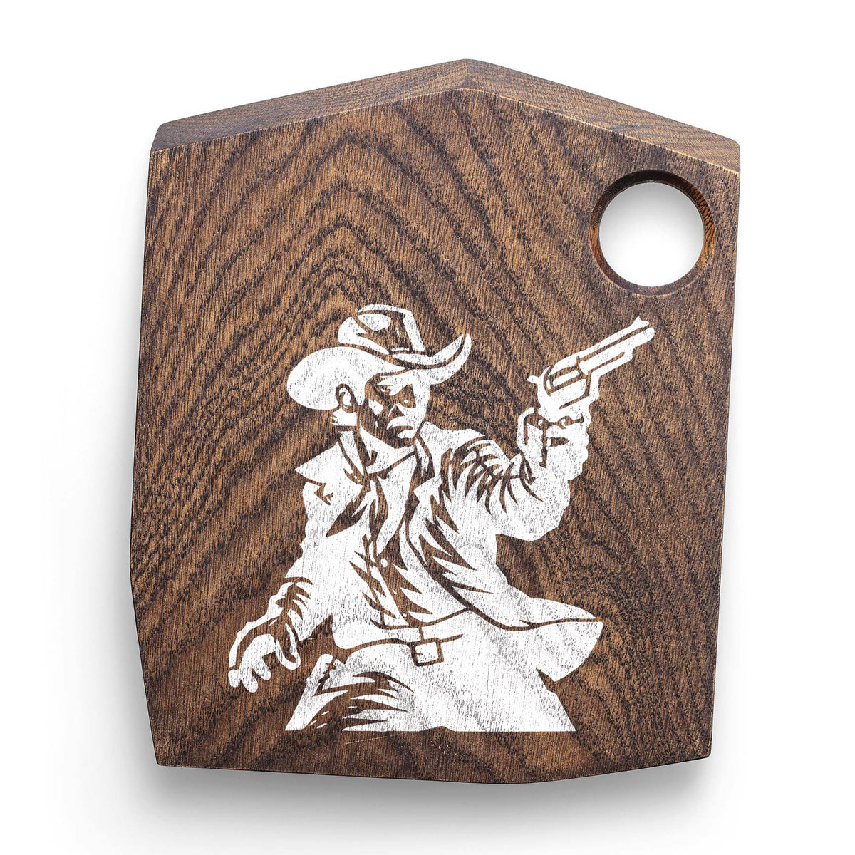 The Western Cowboy Revolver Stencil features a white gunslinger in a cowboy hat on a dark wooden cutting board.