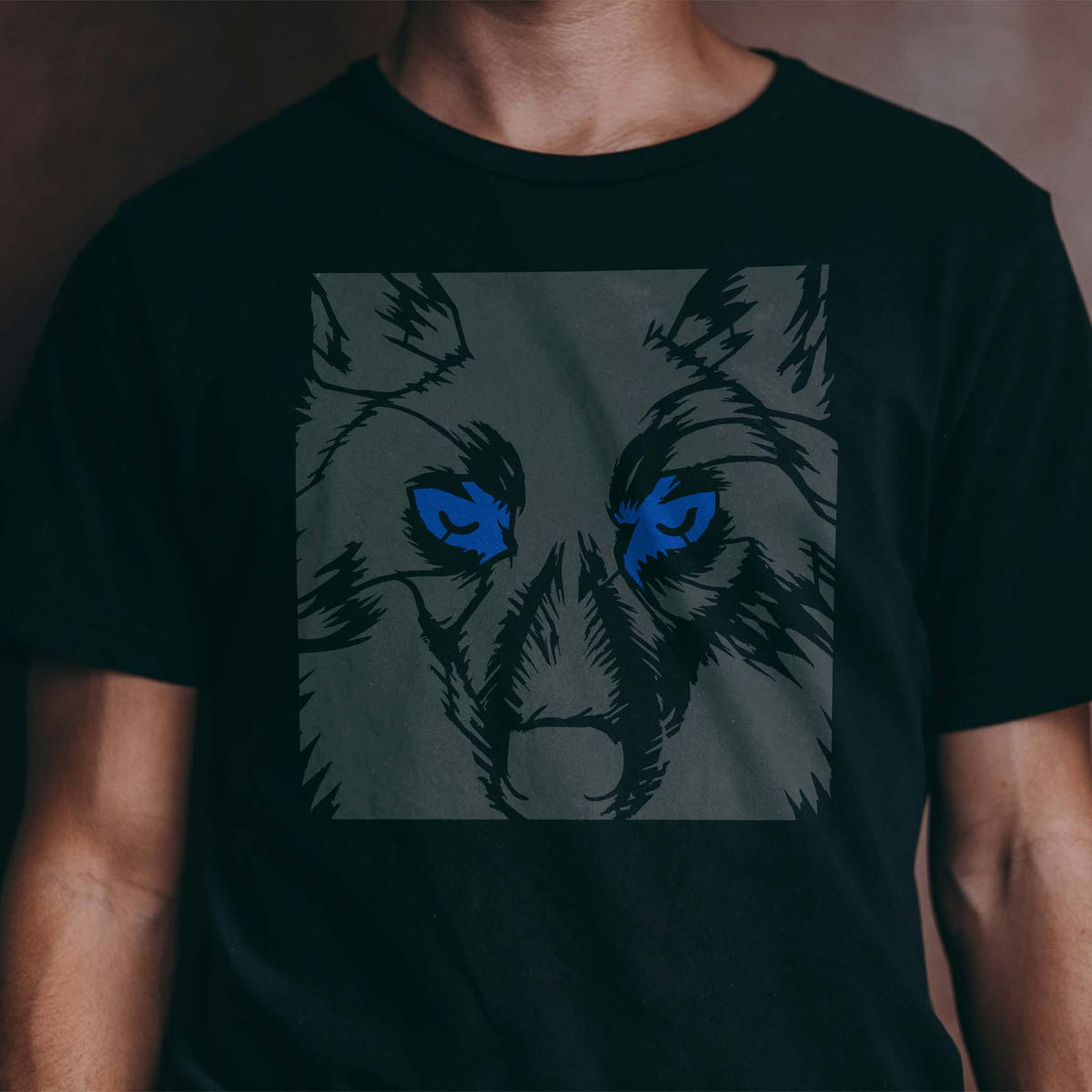Wolf Eyes Close-Up Stencil with vivid blue eyes on black shirt