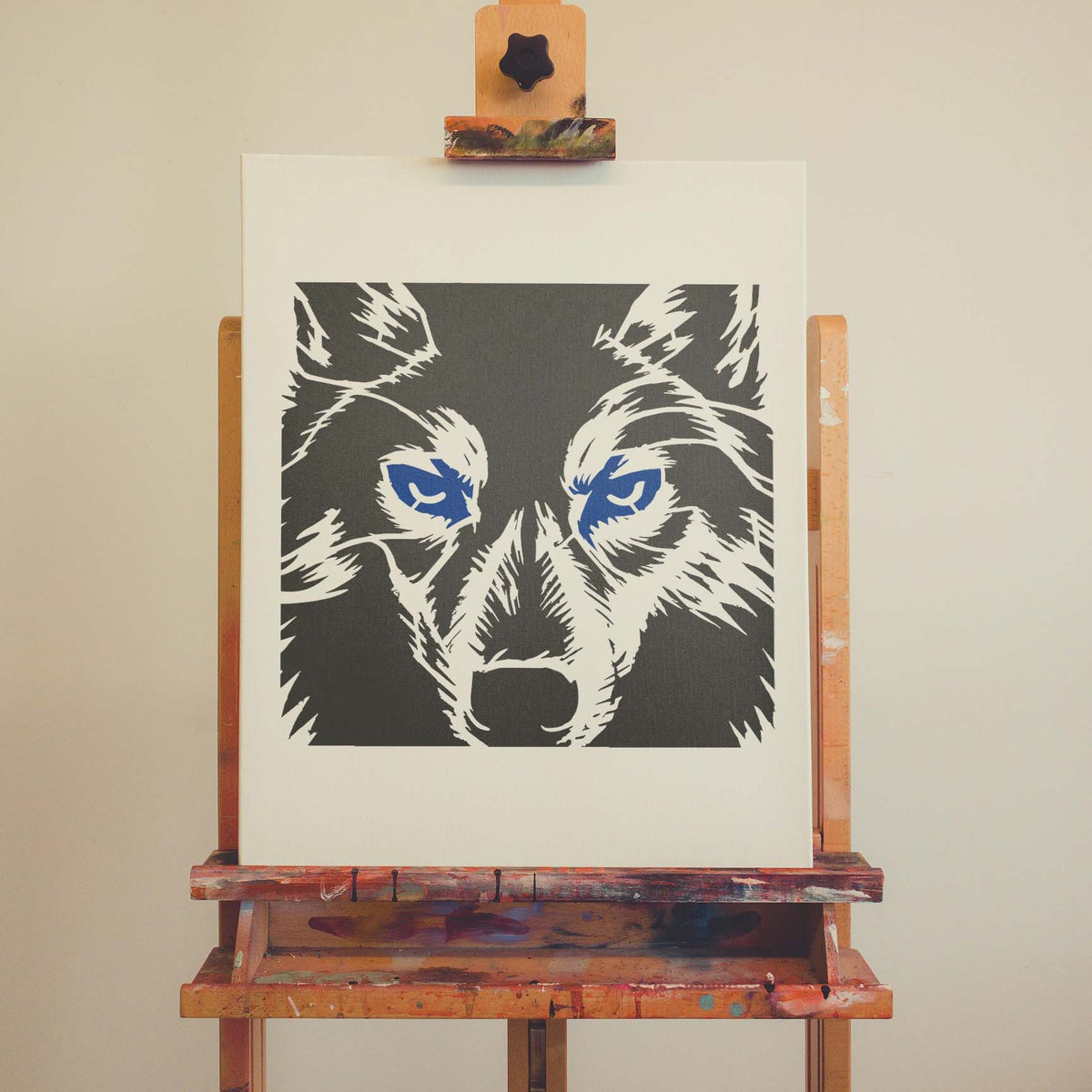 Wolf Eyes Close-Up Stencil with blue eyes painted on canvas