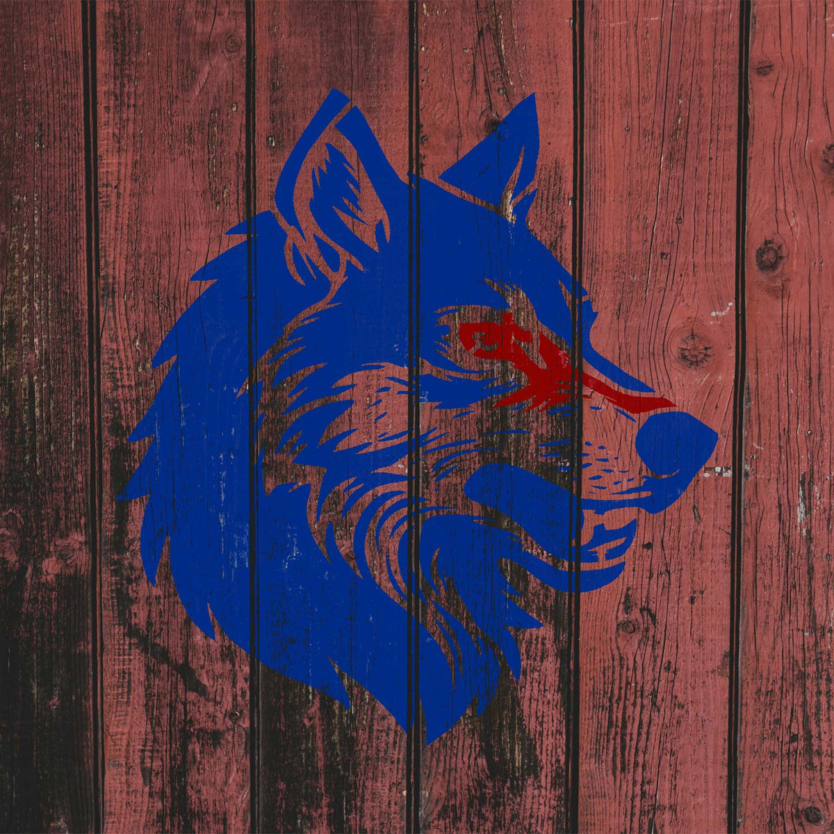 Wolf Head Profile Stencil painted in blue and red on rustic wood panels