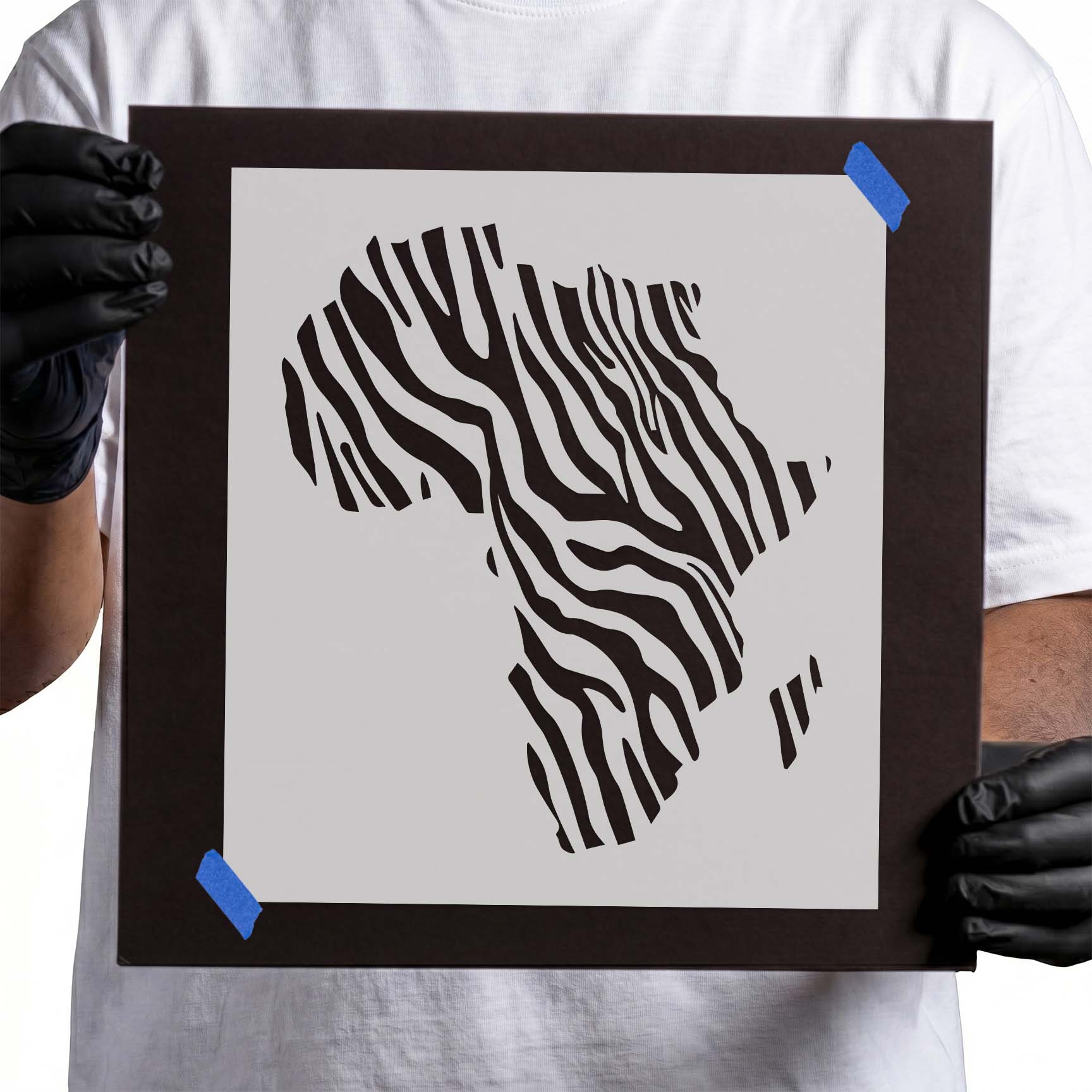 Africa map stencil filled with bold zebra stripe pattern