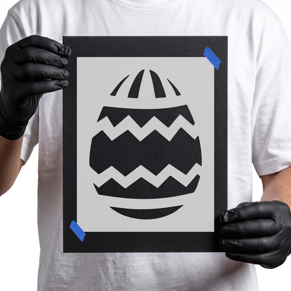 Decorative Easter egg stencil with zigzag stripes and curved accents