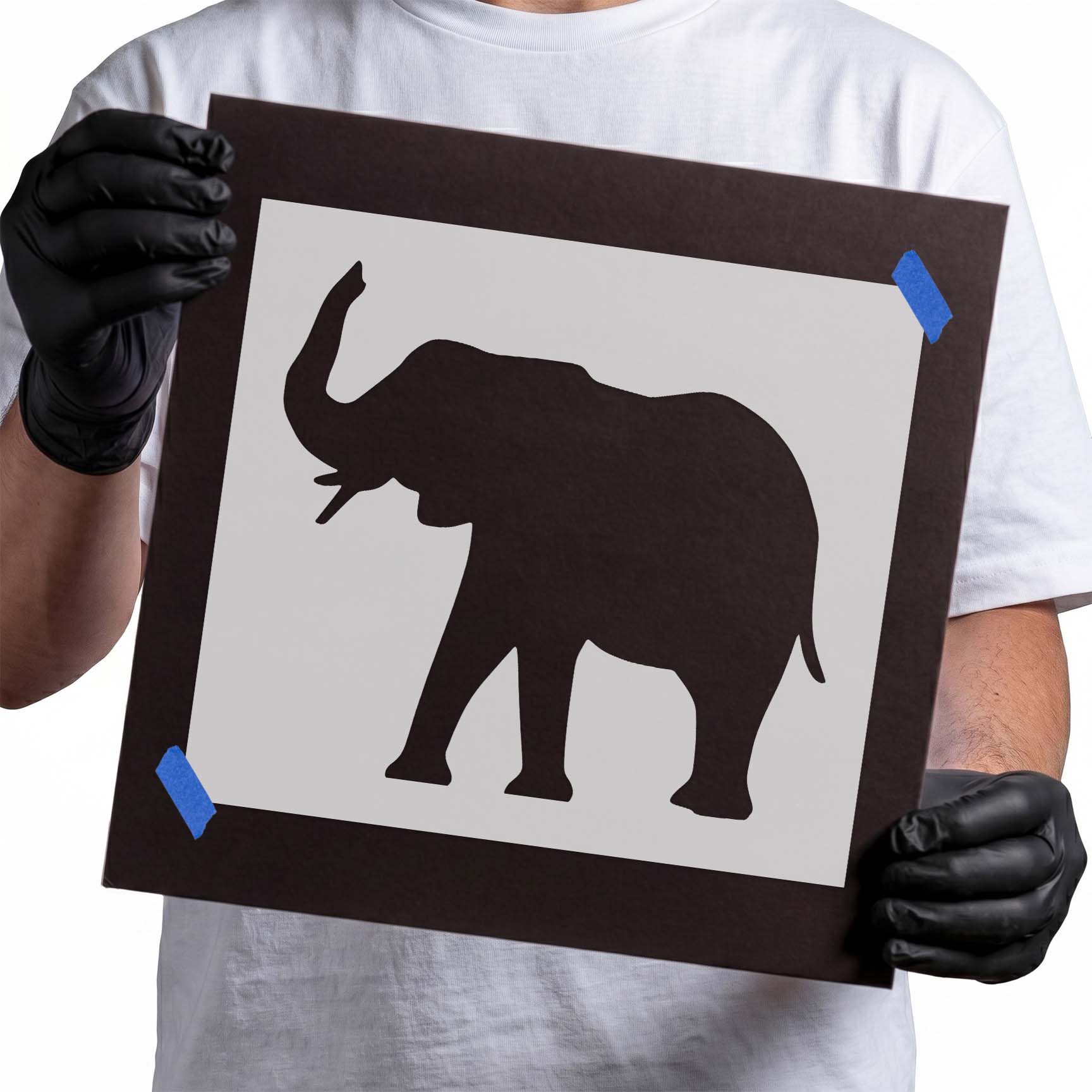 Elephant stencil with raised trunk visible tusks and curved tail