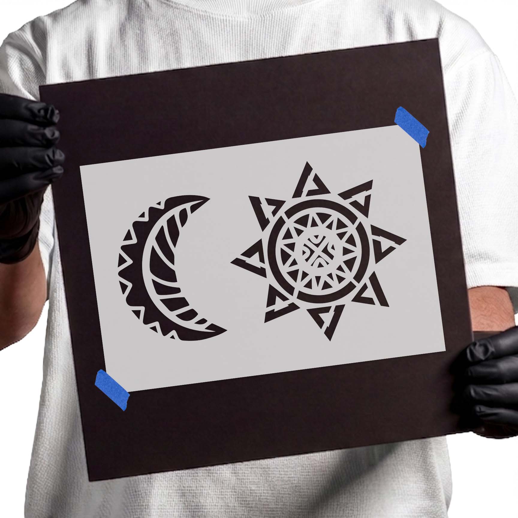 Celestial stencil with geometric crescent moon and ornate radiant sun