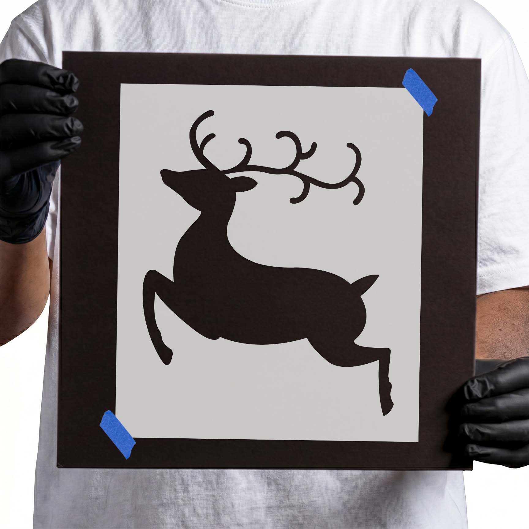 Jumping reindeer stencil with large branching antlers