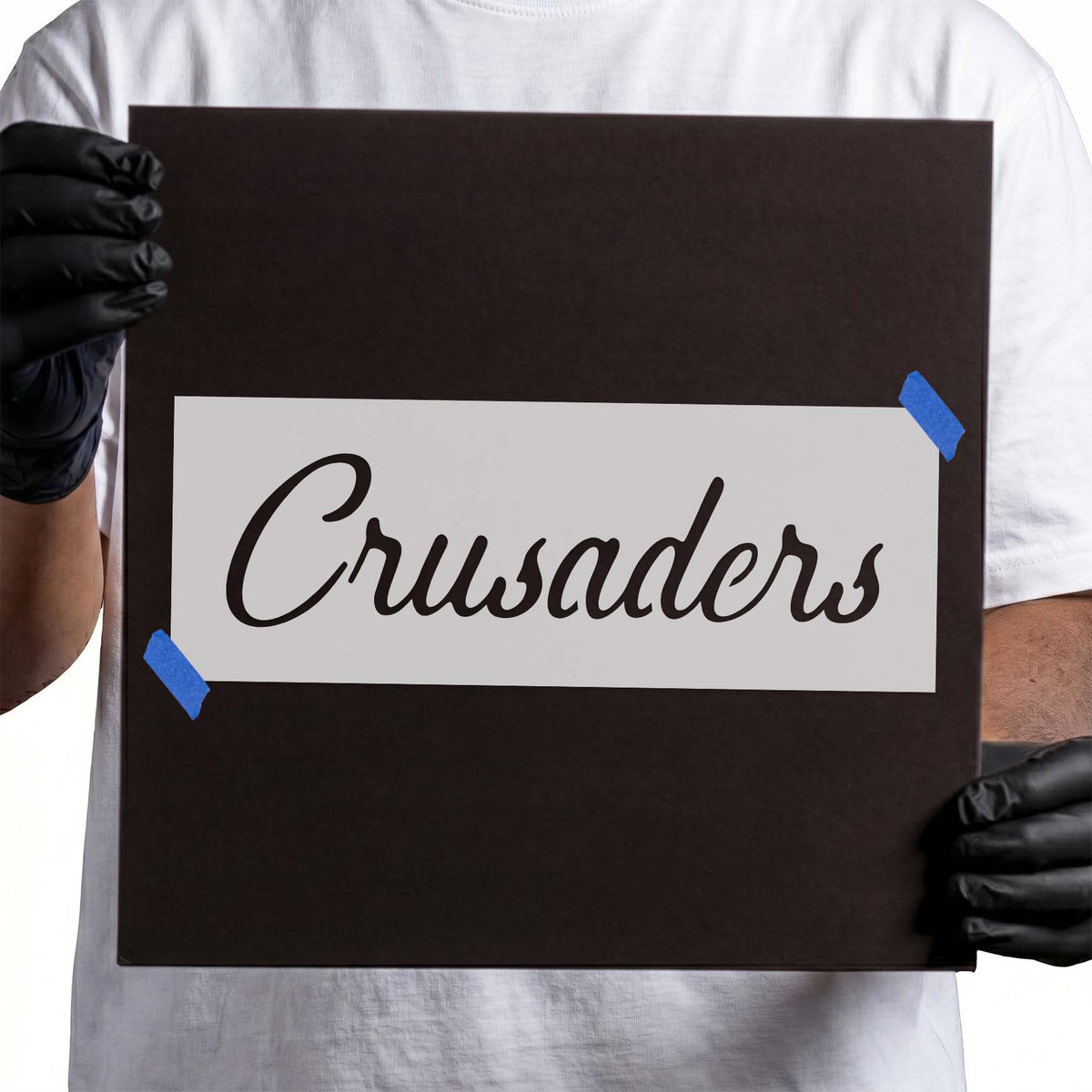 Crusaders mascot stencil with flowing cursive word lettering