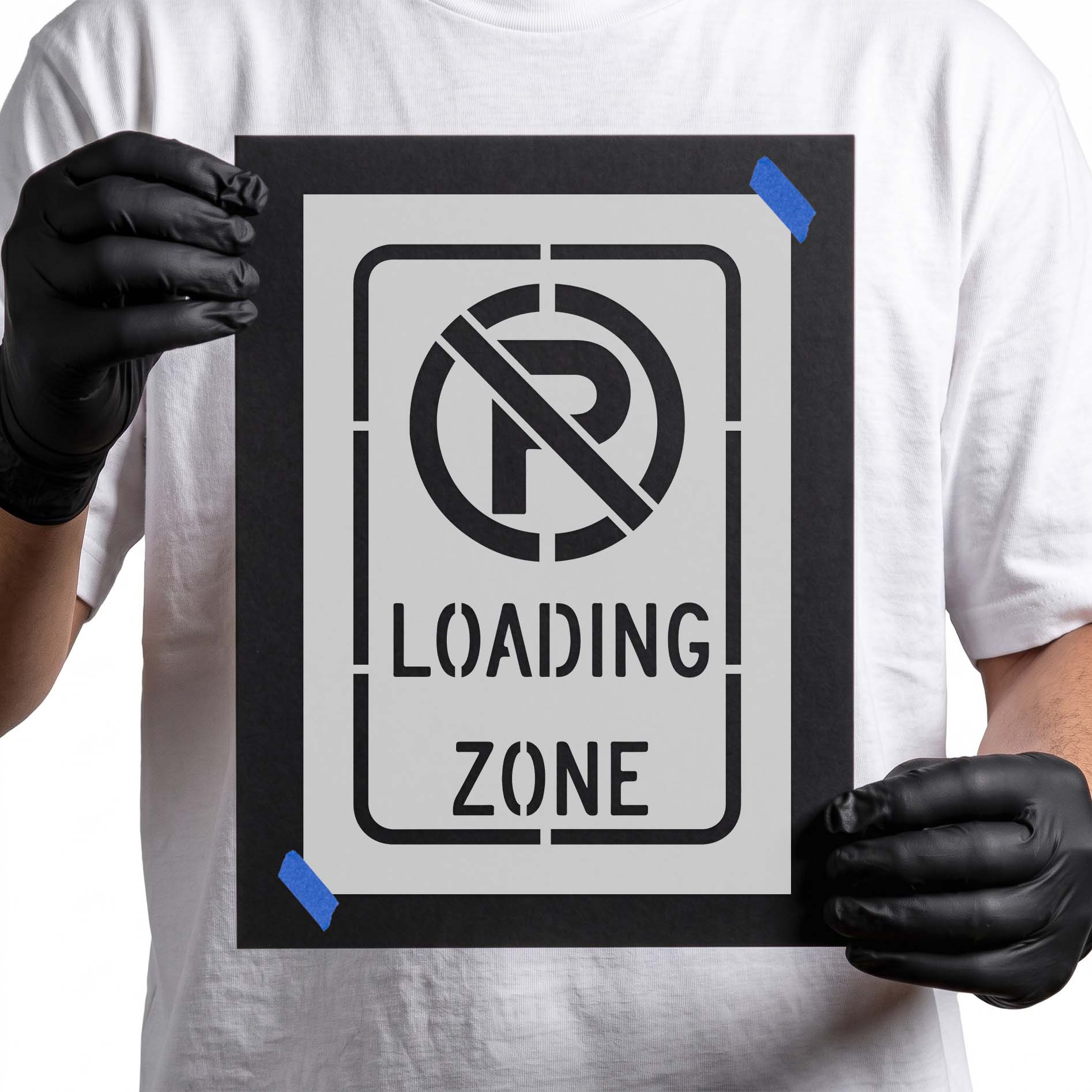 No parking symbol stencil above bold loading zone lettering