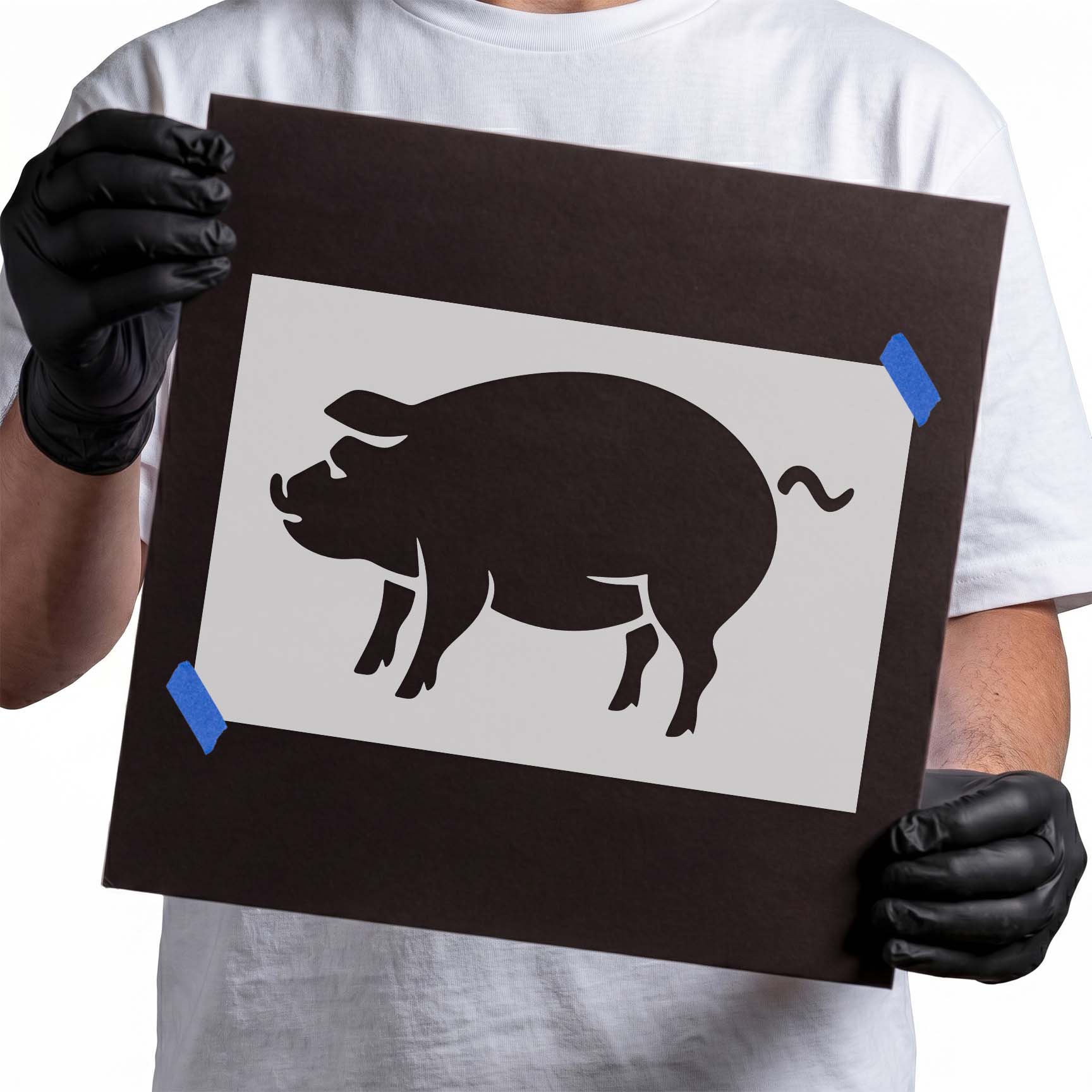 Pig stencil with rounded body, floppy ears, snout, and curly tail