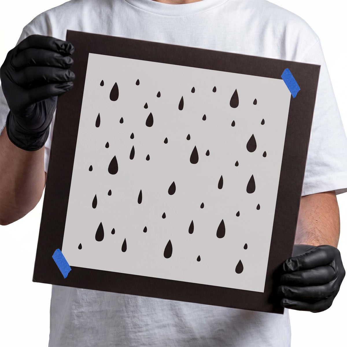 Stencil with scattered raindrops in assorted droplet sizes