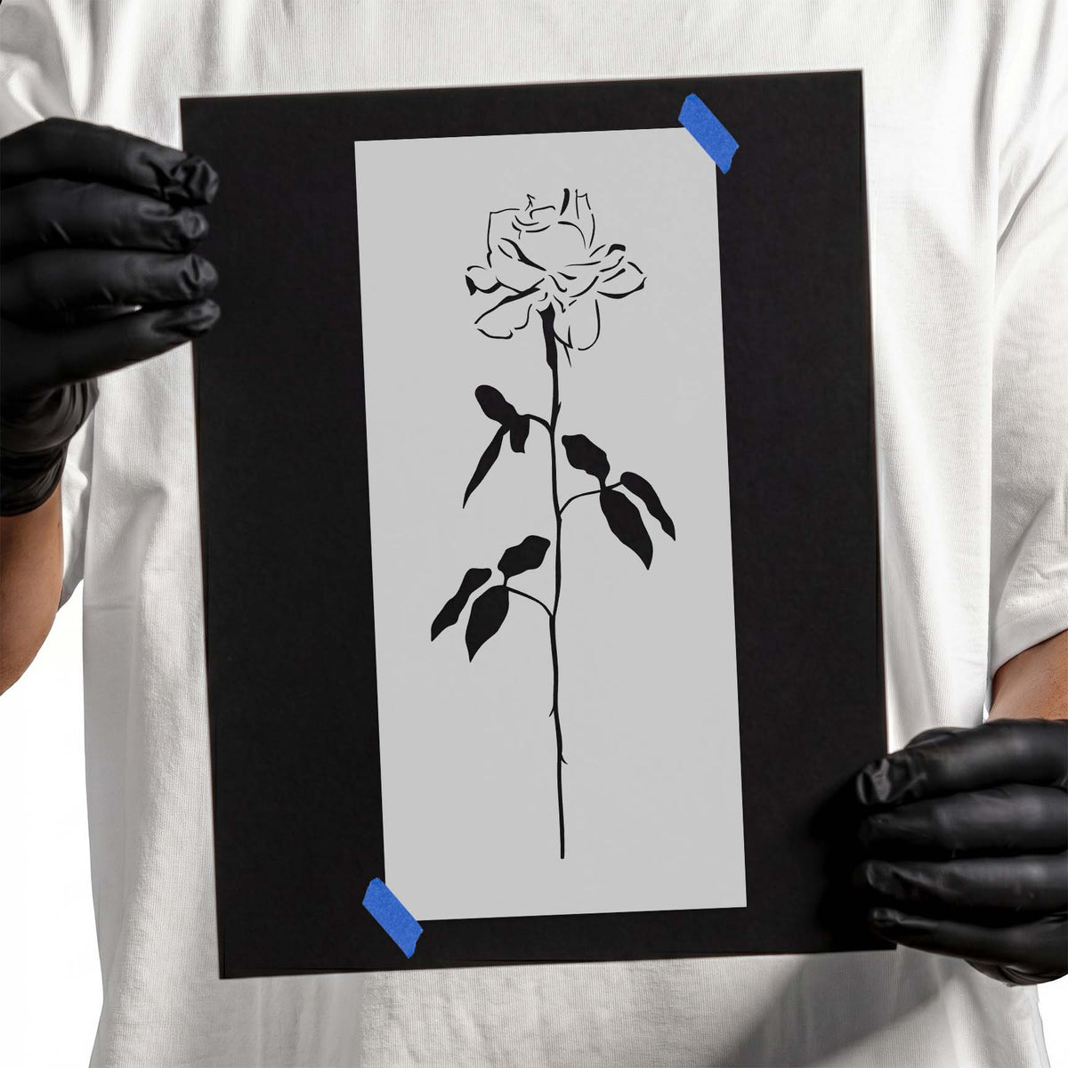 Rose stencil with long slender stem, leaves, and detailed bloom
