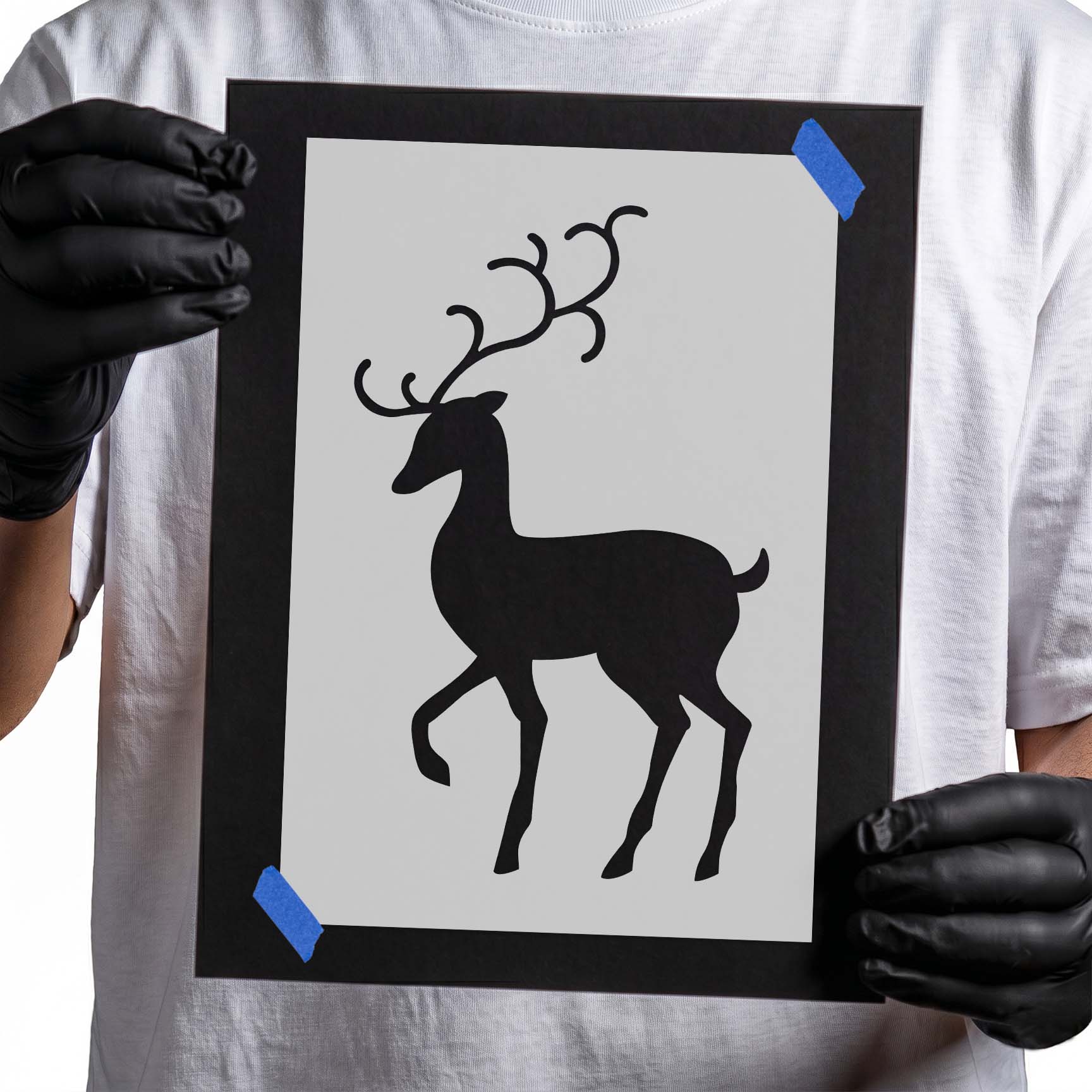 Standing reindeer stencil with sweeping antlers and raised front leg