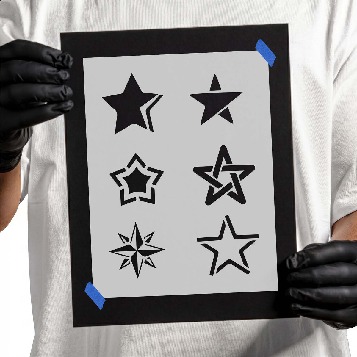 Star stencil featuring six assorted solid outlined and geometric stars
