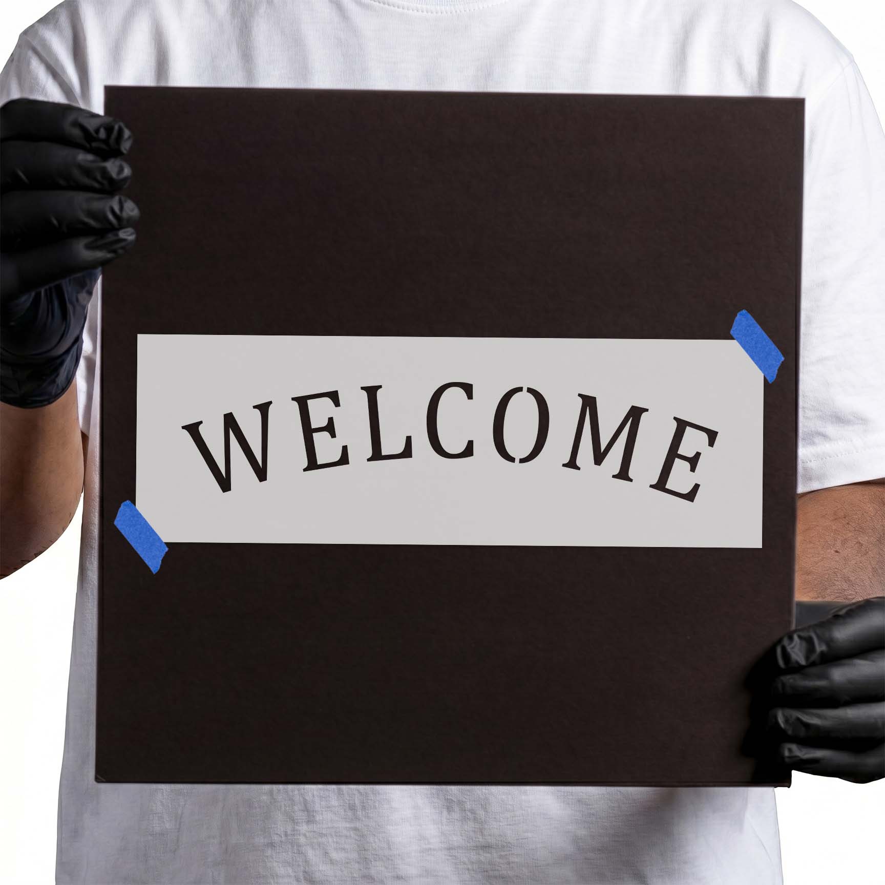 Welcome stencil with uppercase lettering arranged in a rounded arch