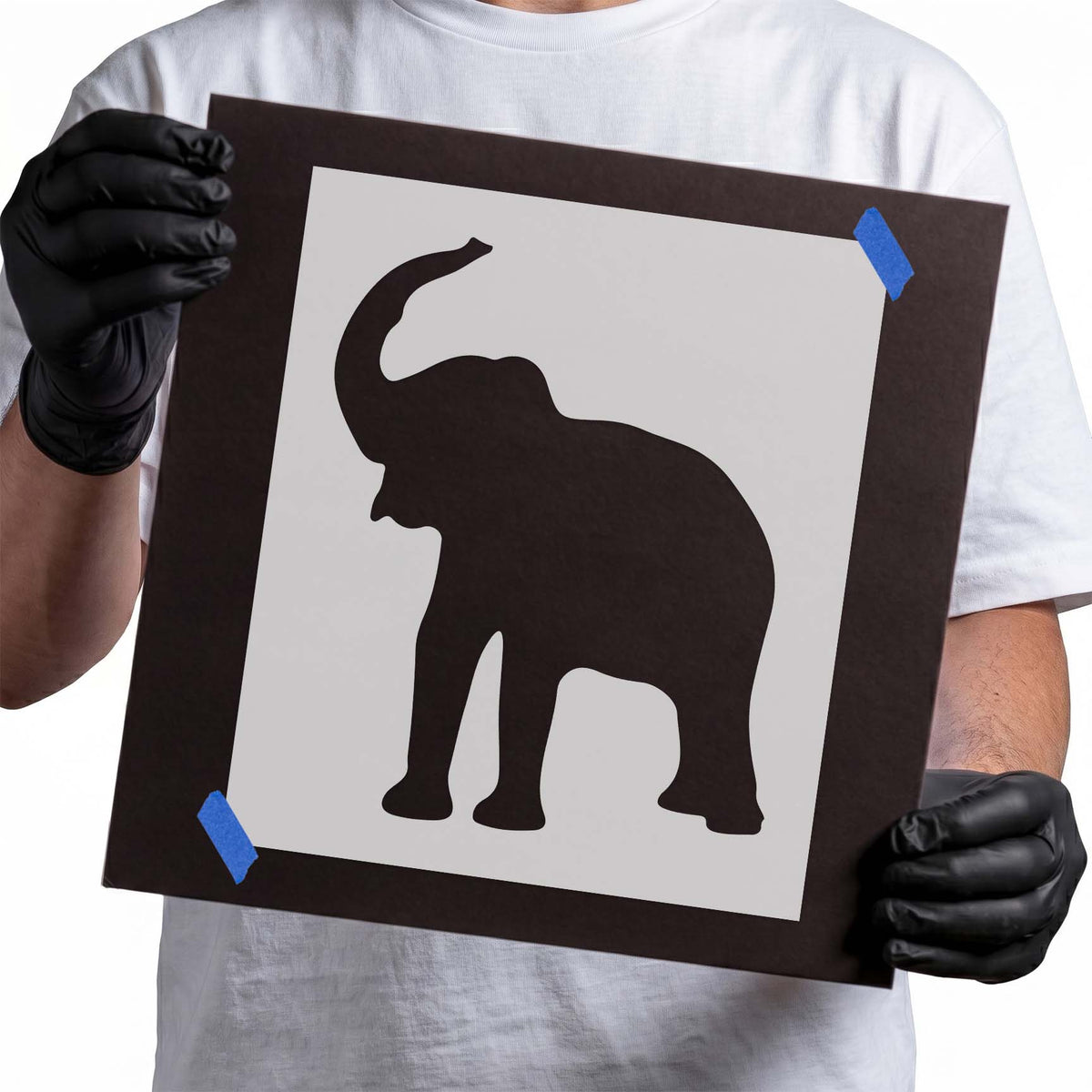 Elephant stencil silhouette standing with trunk curved upward