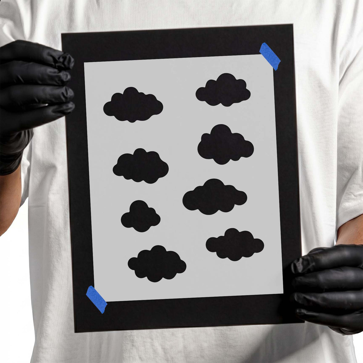 Cloud stencil featuring eight assorted rounded cloud silhouettes