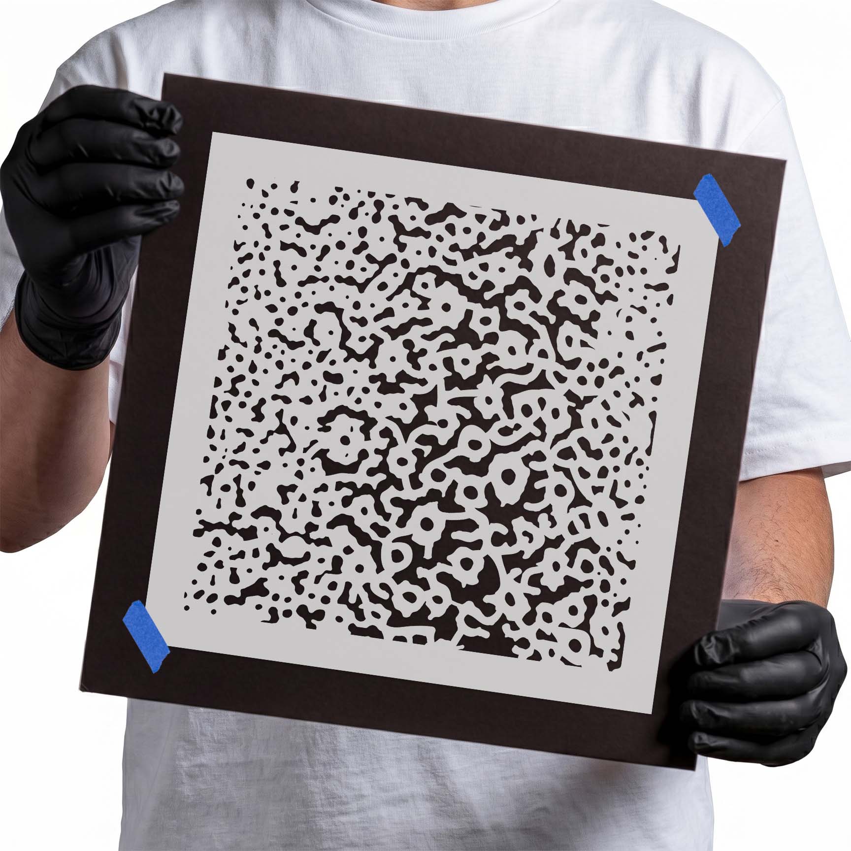Stencil with asymmetrical dots, rings, squiggles, and organic abstract shapes