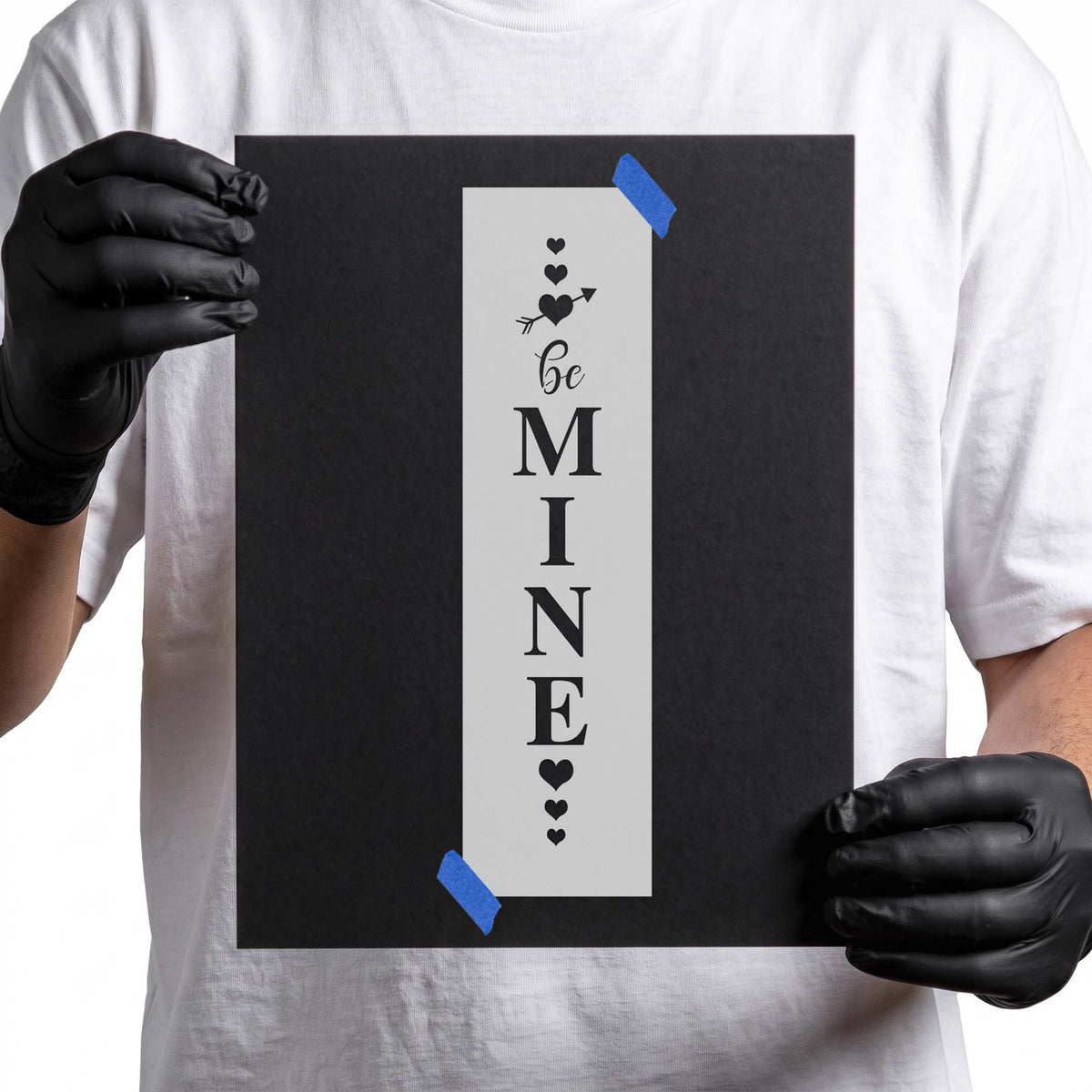 Be Mine stencil with vertical lettering, hearts, and arrow accent