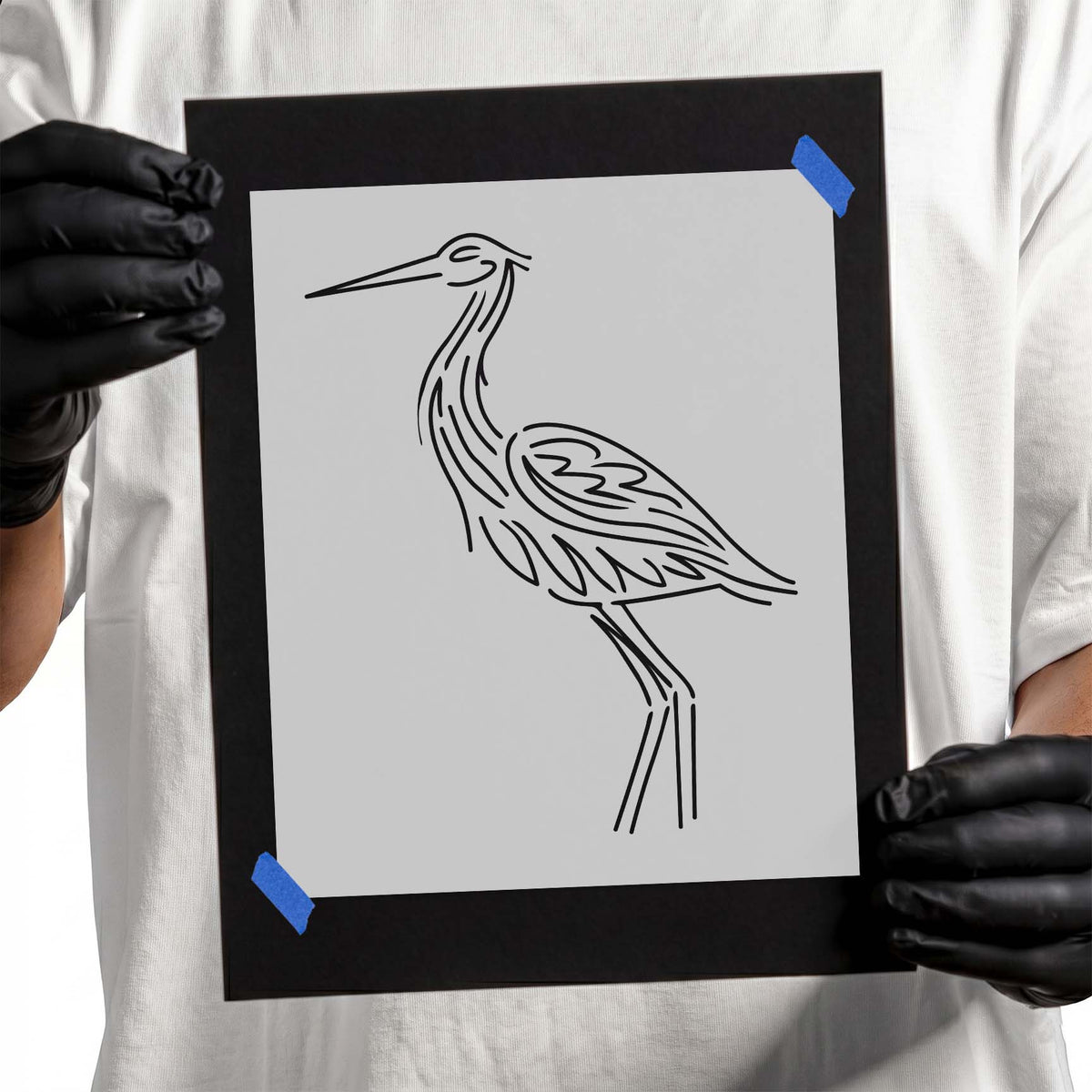 Blue heron stencil with long beak and detailed feather outlines
