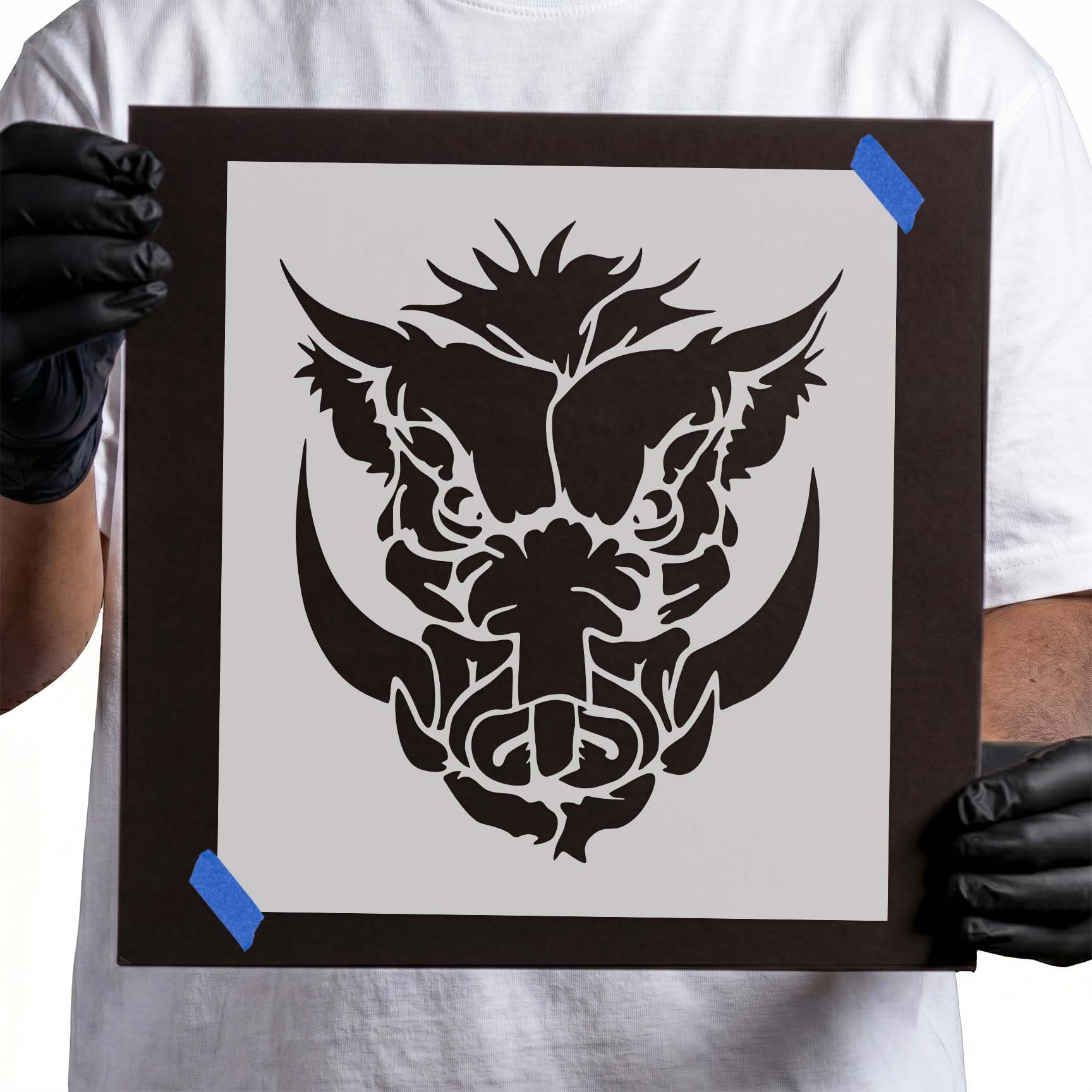 Wild boar head stencil with prominent tusks and detailed facial features