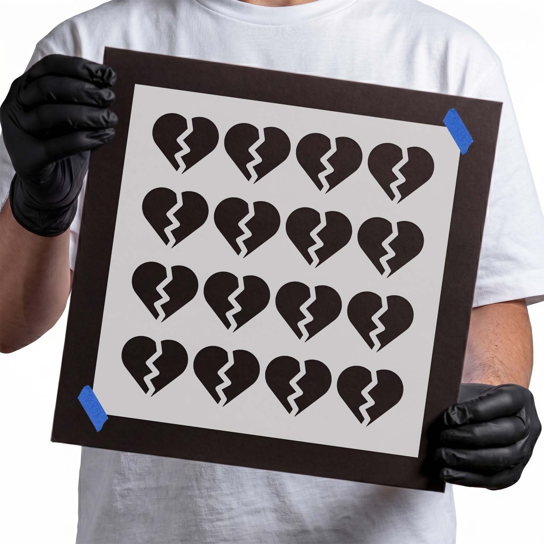 Repeating broken heart stencil pattern with jagged center cracks
