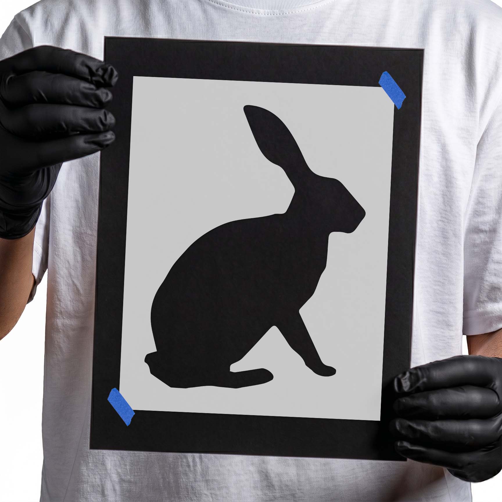 Bunny rabbit stencil with simple seated silhouette and tall ear