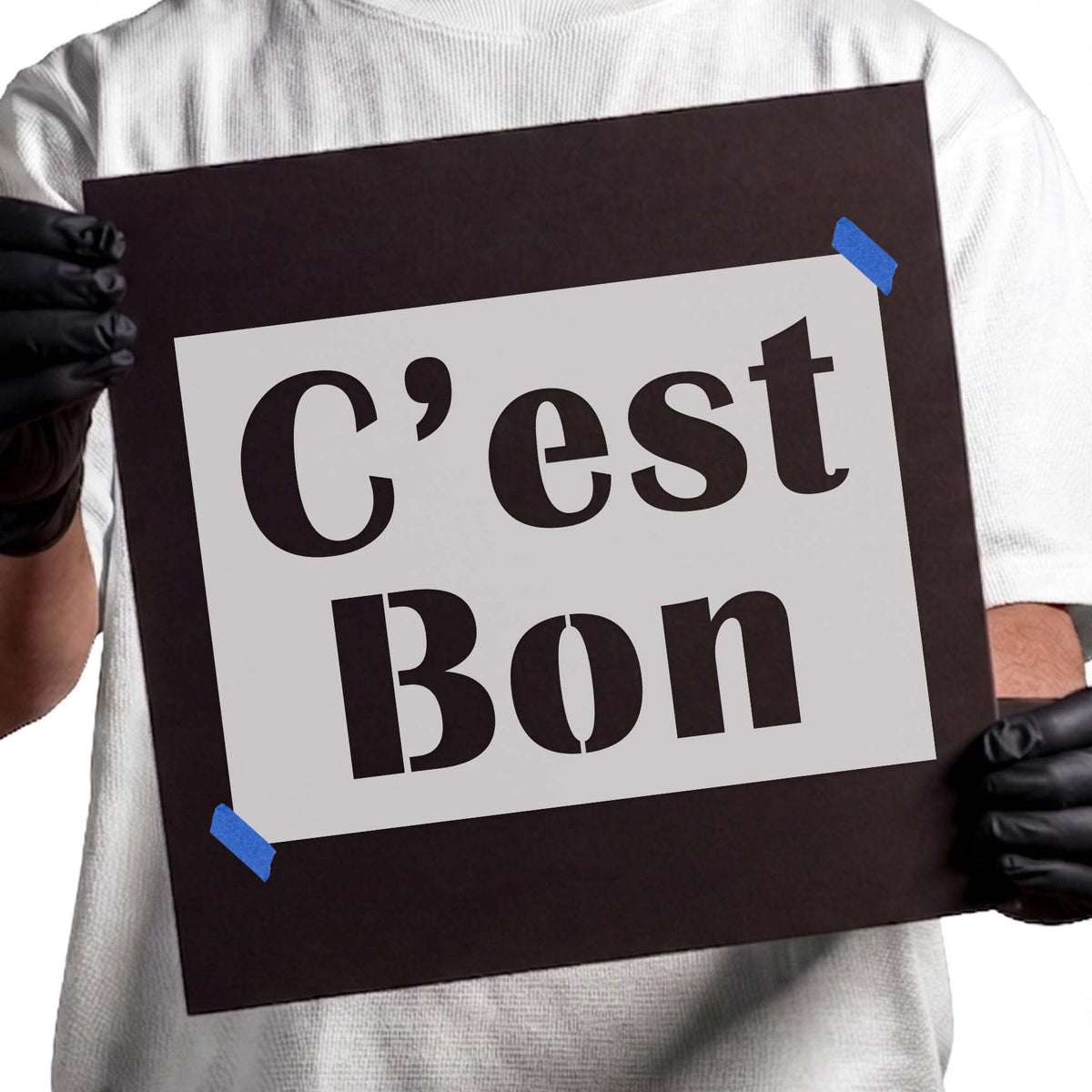 Bold C'est Bon stencil with large two-line French lettering