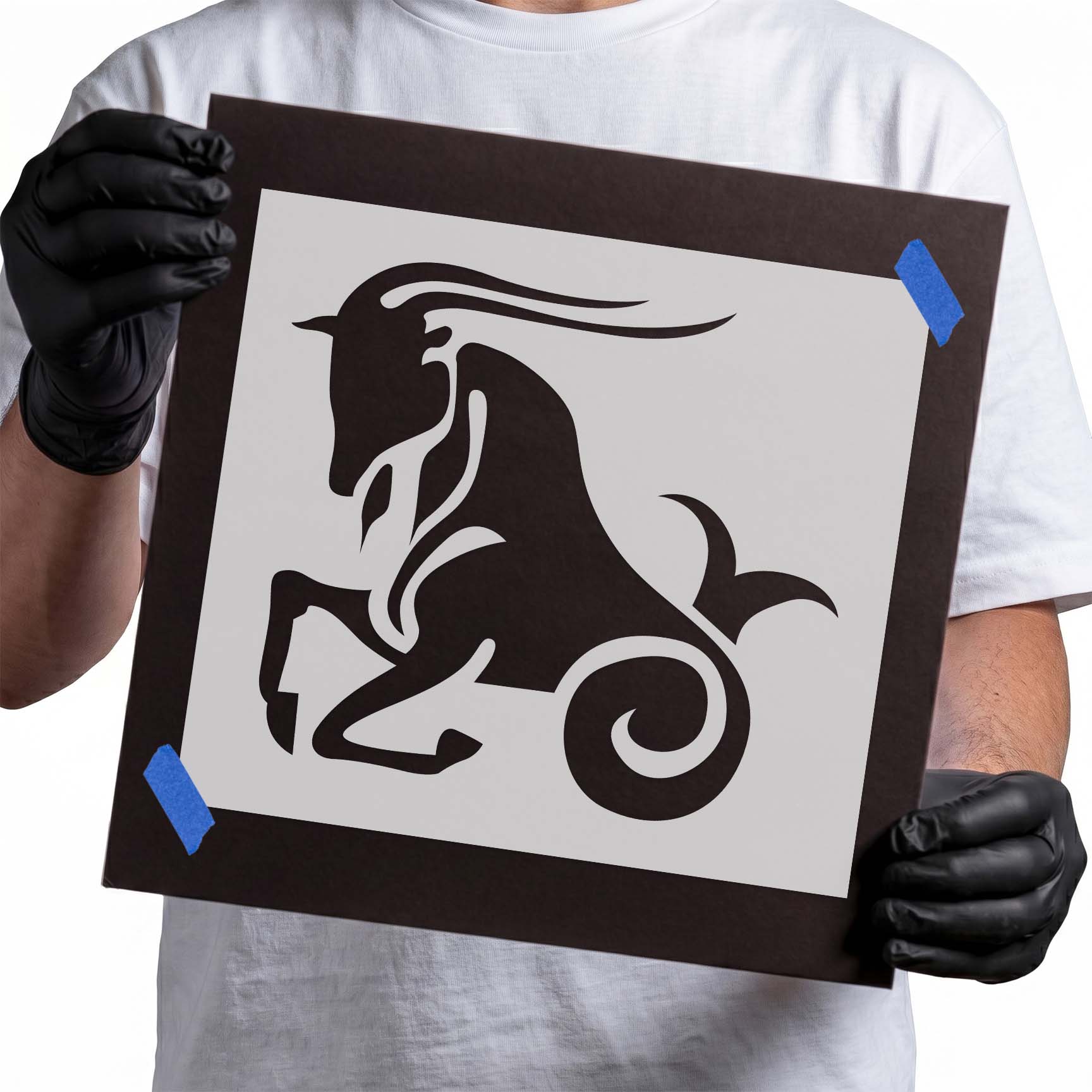 Capricorn stencil with stylized sea-goat, sweeping horns and curled tail