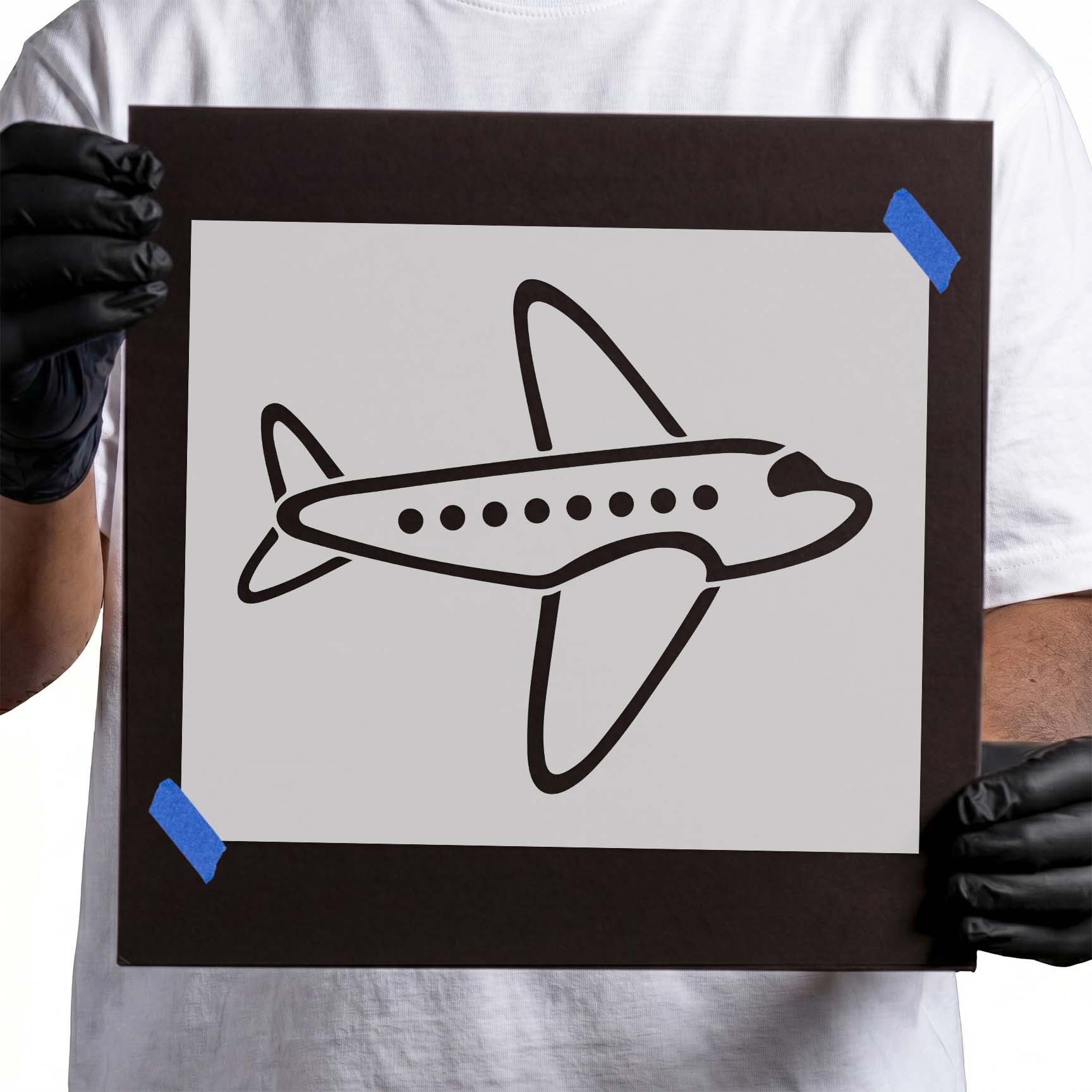 Cartoon airplane stencil with wings tail fins and round windows