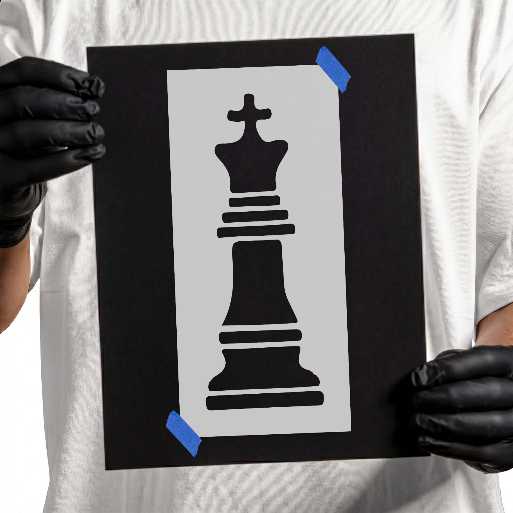 Chess piece king stencil featuring a classic king silhouette with cross top 