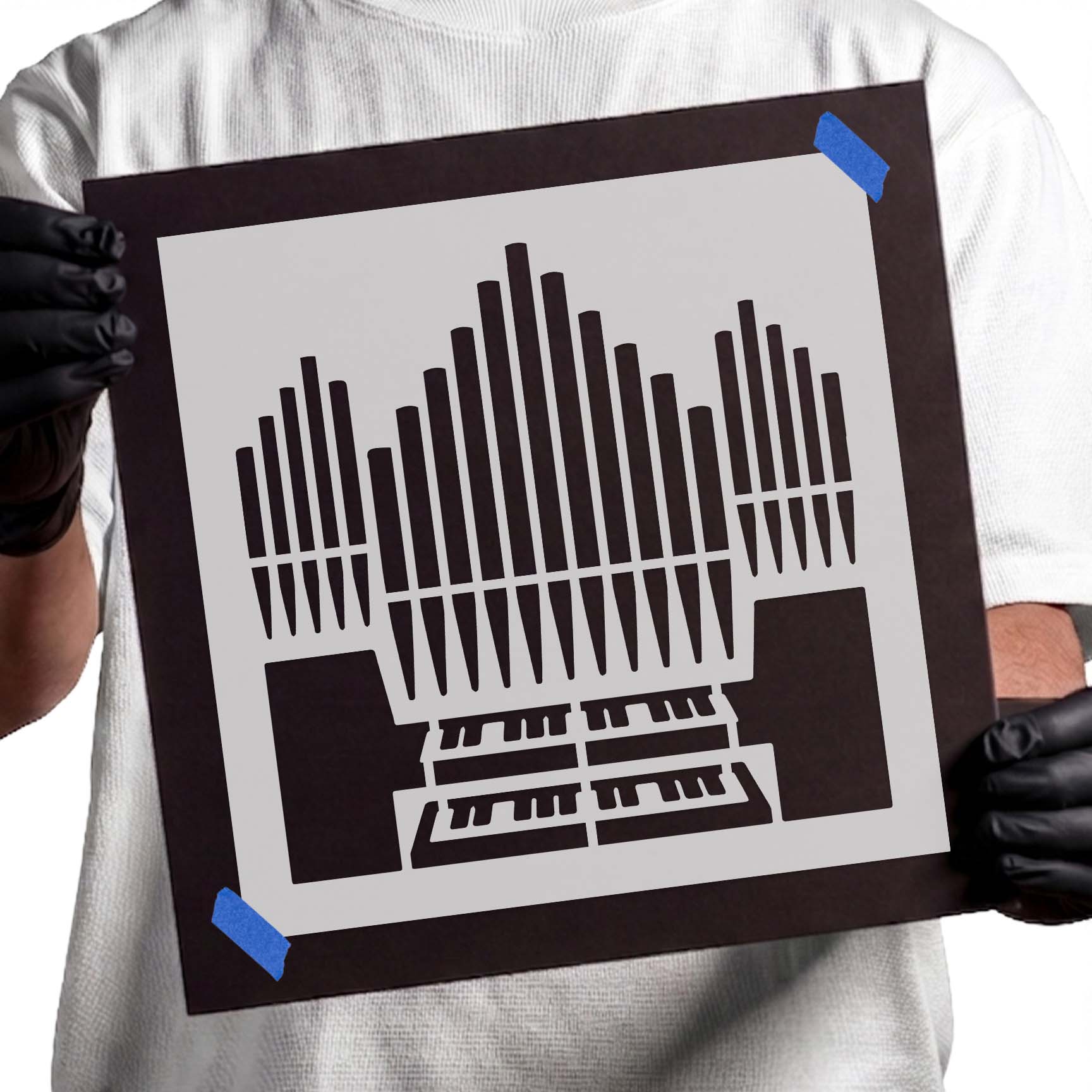 Church organ stencil with tall pipes and stacked keyboards