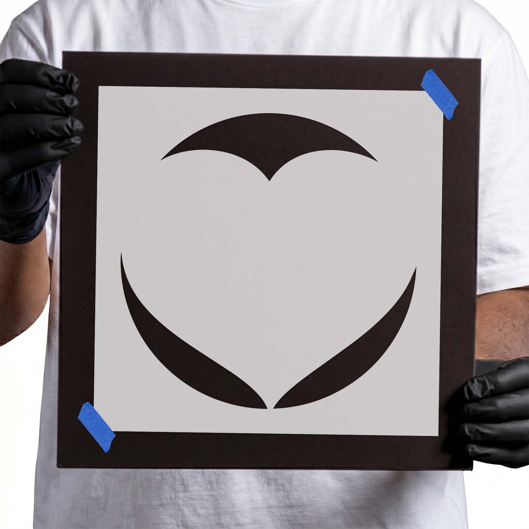 Circular heart stencil formed by smooth curved negative space shapes