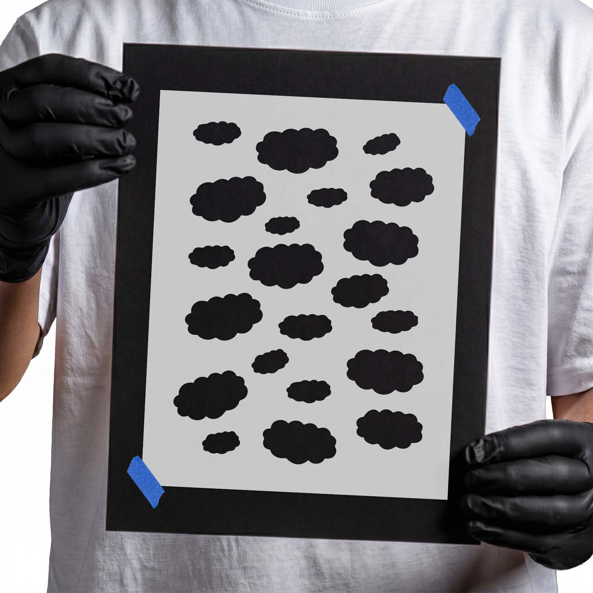 Cloud pattern stencil featuring scattered fluffy clouds with rounded edges in assorted sizes