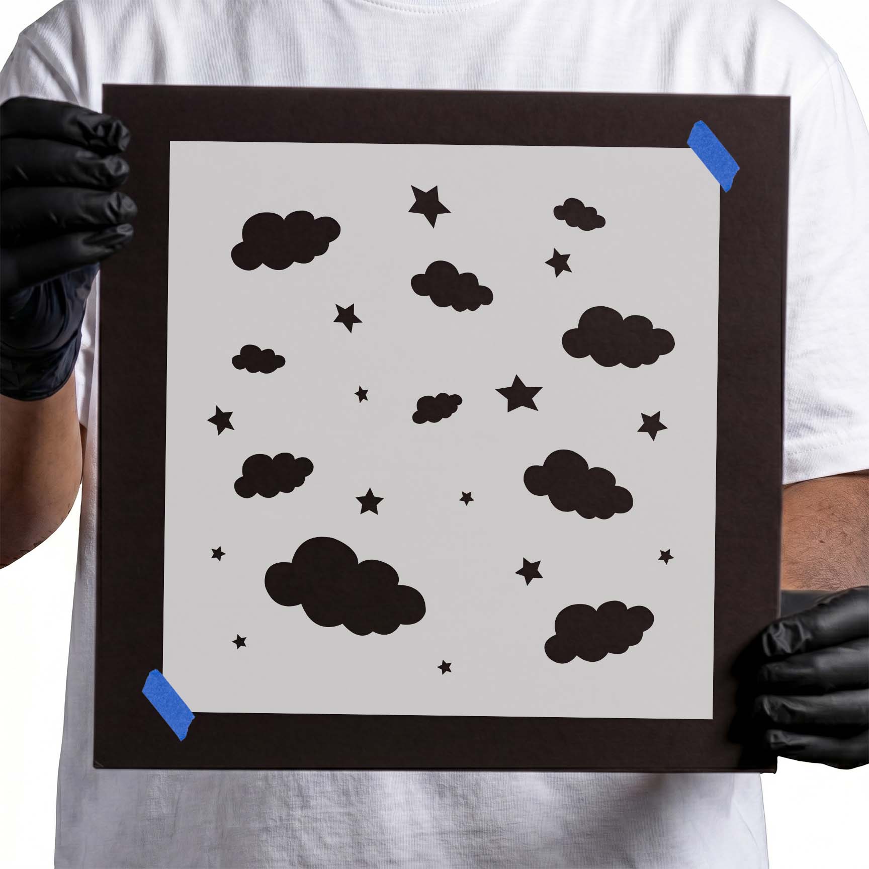 Clouds and stars stencil with scattered celestial pattern